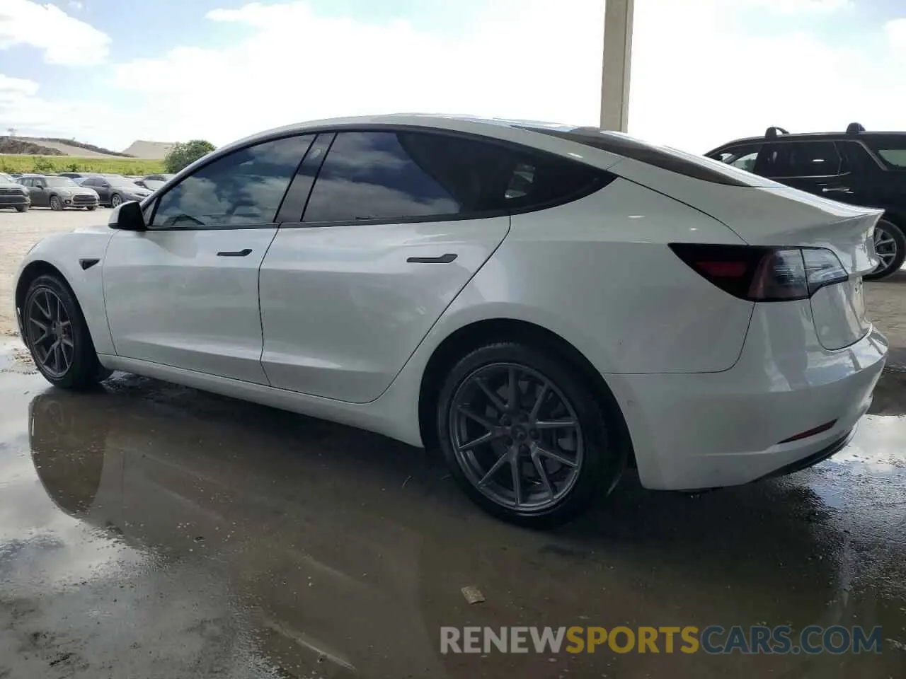 2 fotografías del automóvil dañado 5YJ3E1EBXMF993027 TESLA MODEL 3 2021
