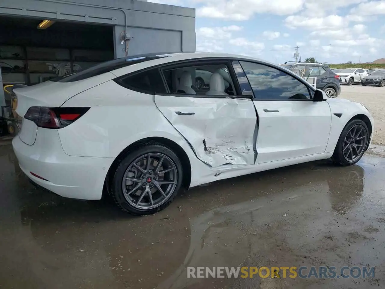 3 fotografías del automóvil dañado 5YJ3E1EBXMF993027 TESLA MODEL 3 2021