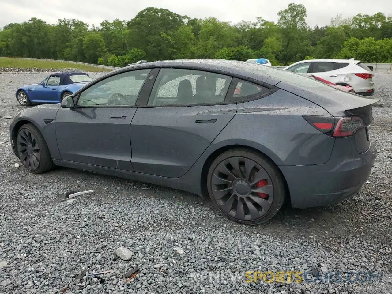 2 fotografías del automóvil dañado 5YJ3E1EC0MF913646 TESLA MODEL 3 2021
