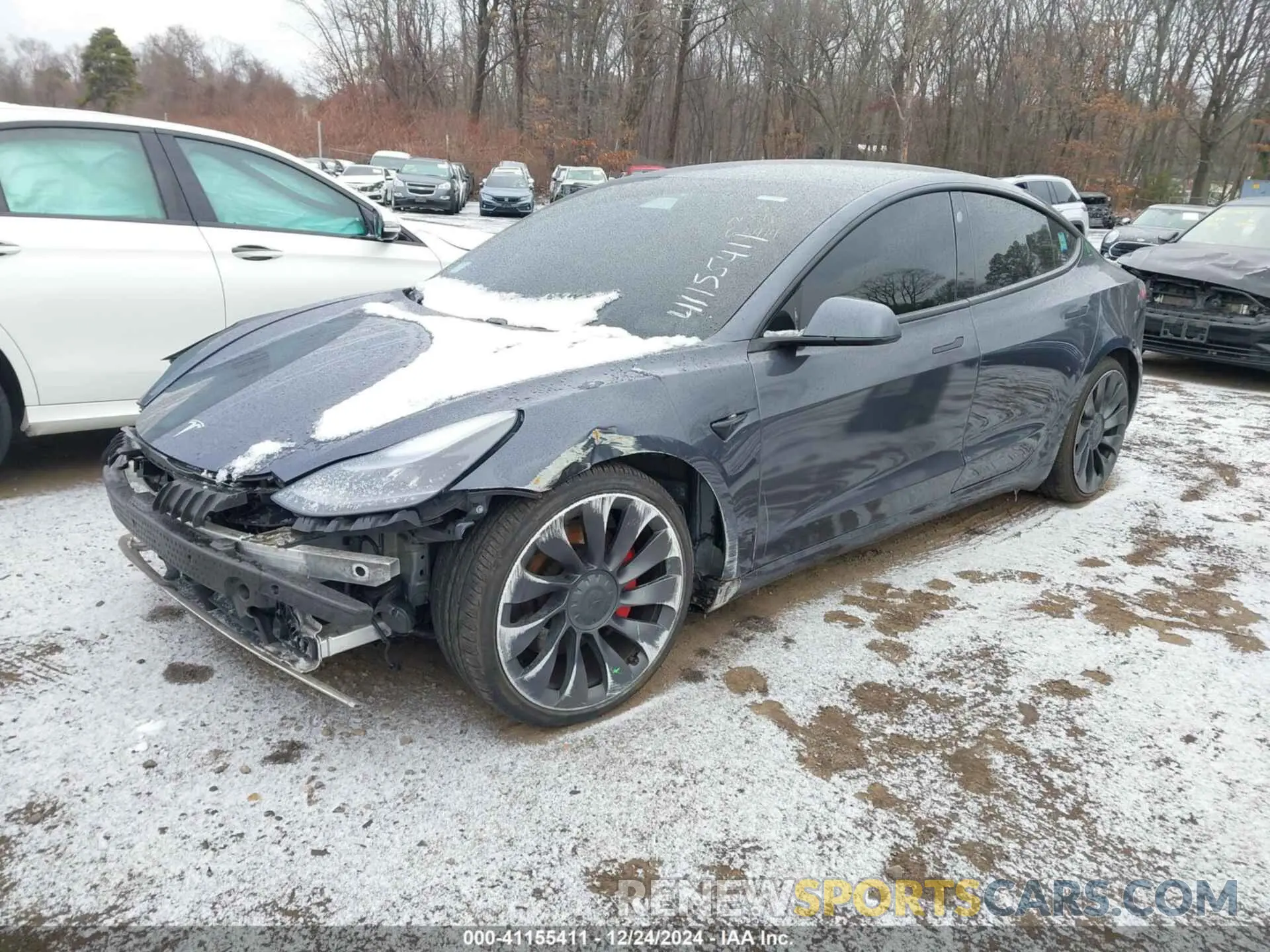 2 fotografías del automóvil dañado 5YJ3E1EC1MF063414 TESLA MODEL 3 2021