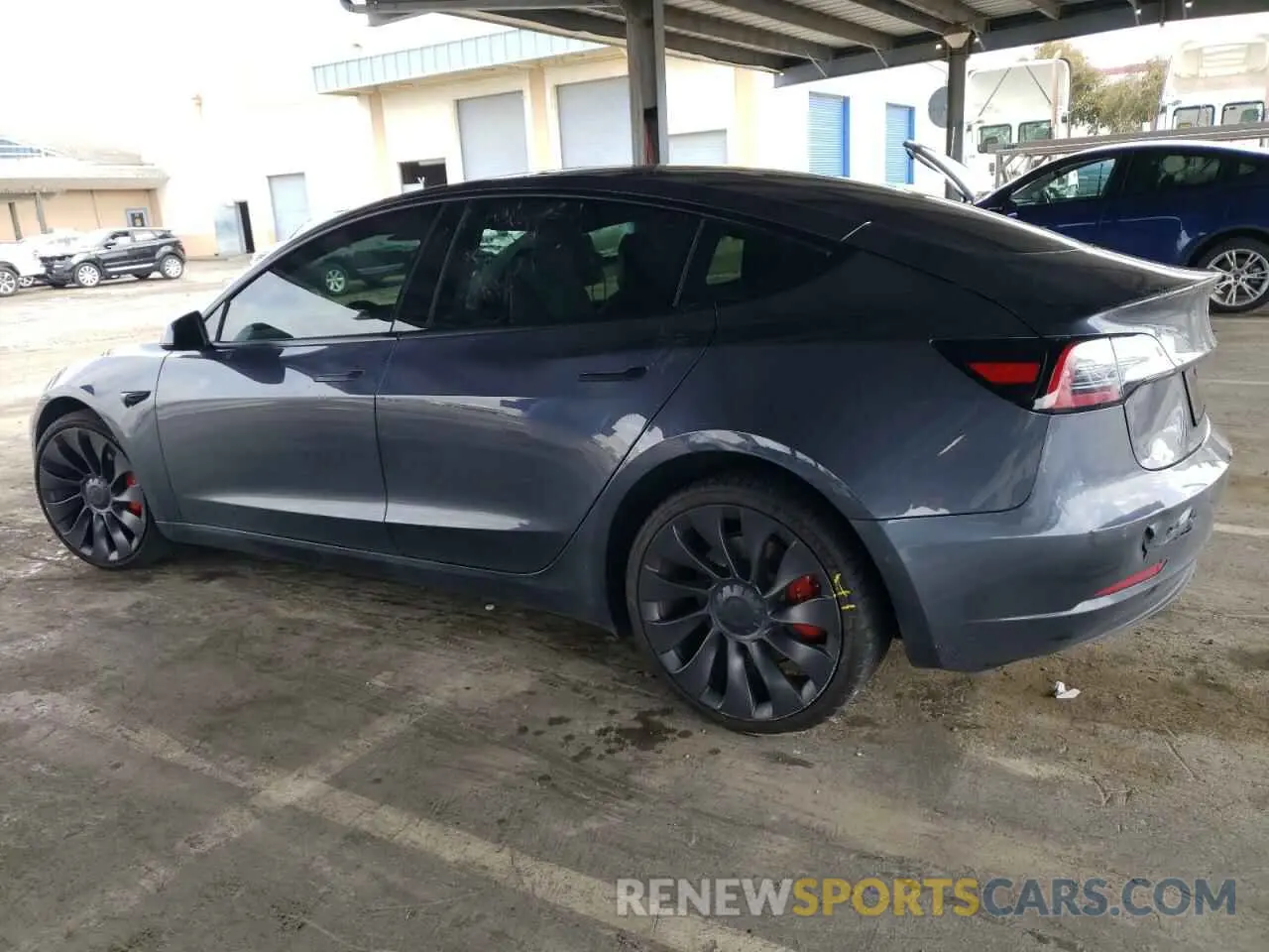 2 fotografías del automóvil dañado 5YJ3E1EC1MF074350 TESLA MODEL 3 2021