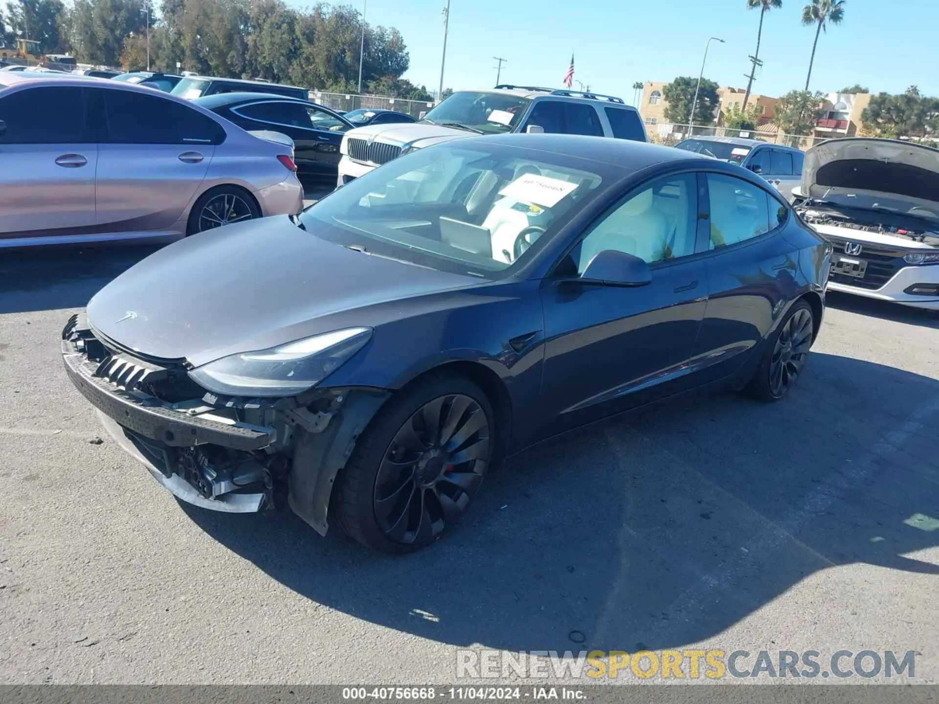 2 fotografías del automóvil dañado 5YJ3E1EC1MF090161 TESLA MODEL 3 2021