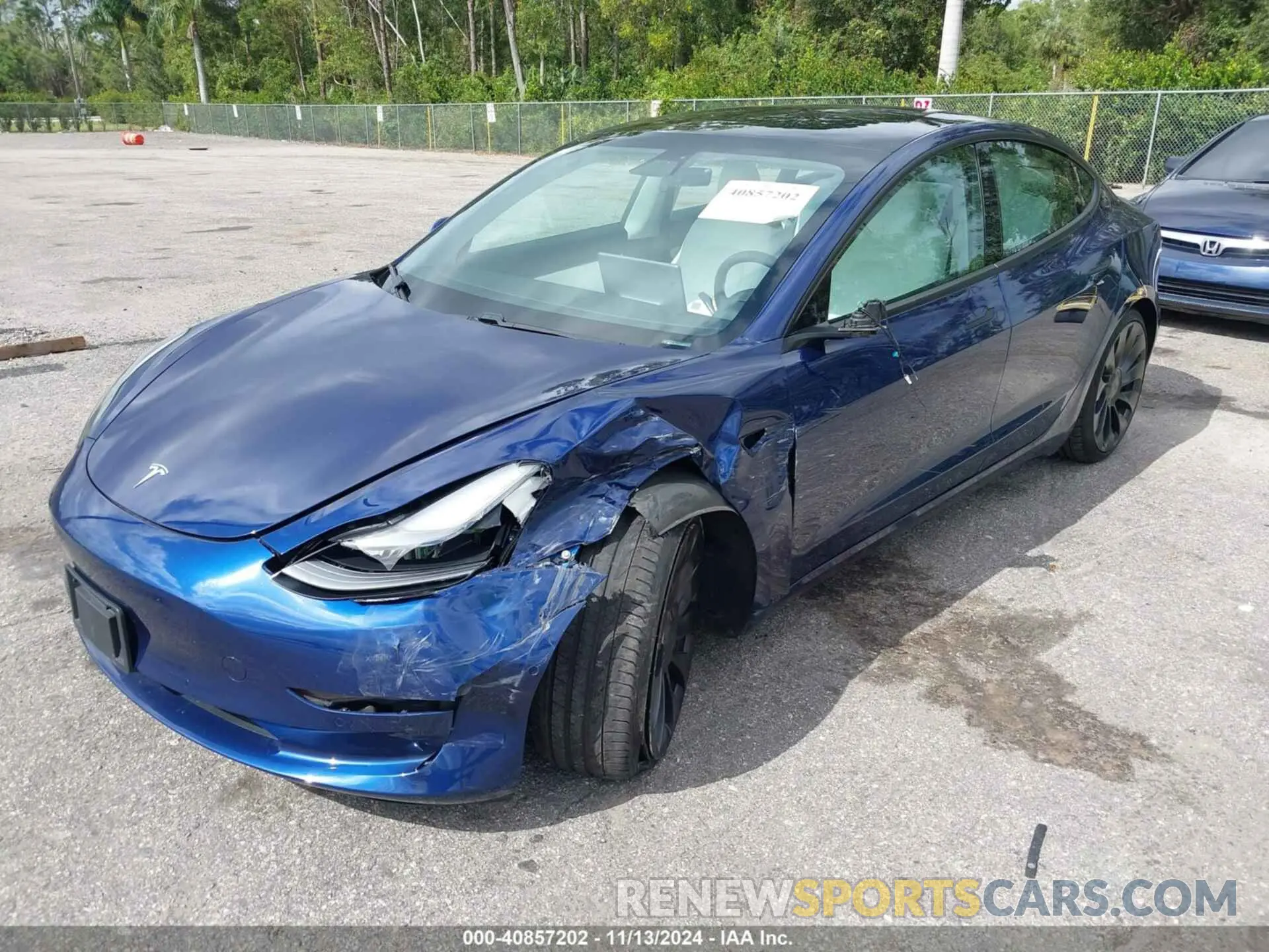 2 fotografías del automóvil dañado 5YJ3E1EC1MF919276 TESLA MODEL 3 2021