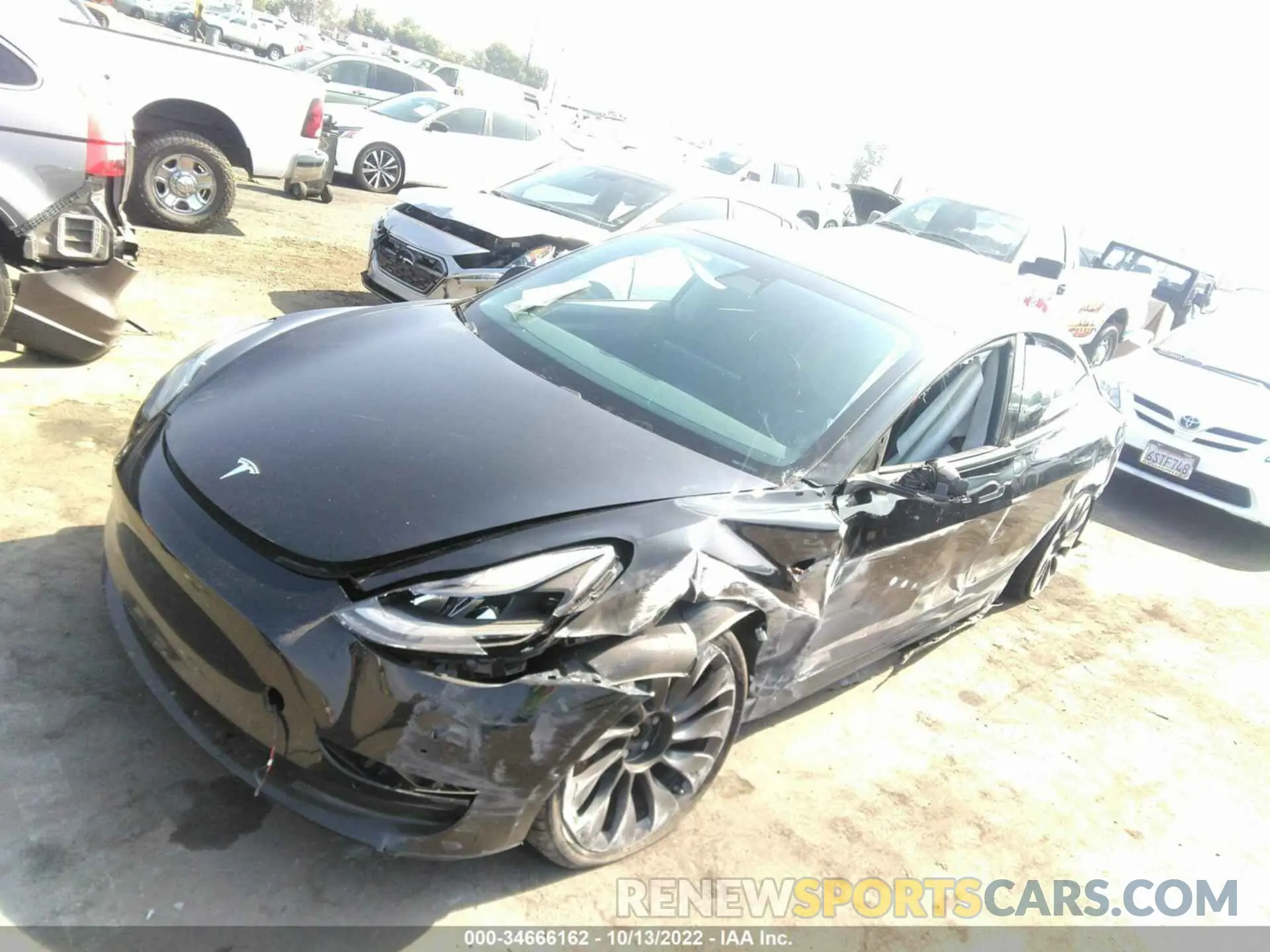 2 fotografías del automóvil dañado 5YJ3E1EC2MF030213 TESLA MODEL 3 2021