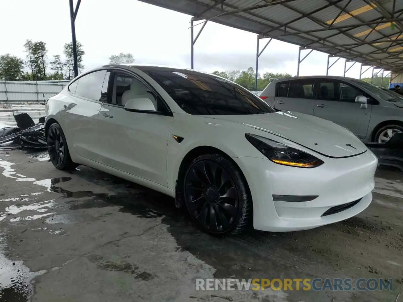 4 fotografías del automóvil dañado 5YJ3E1EC2MF061168 TESLA MODEL 3 2021