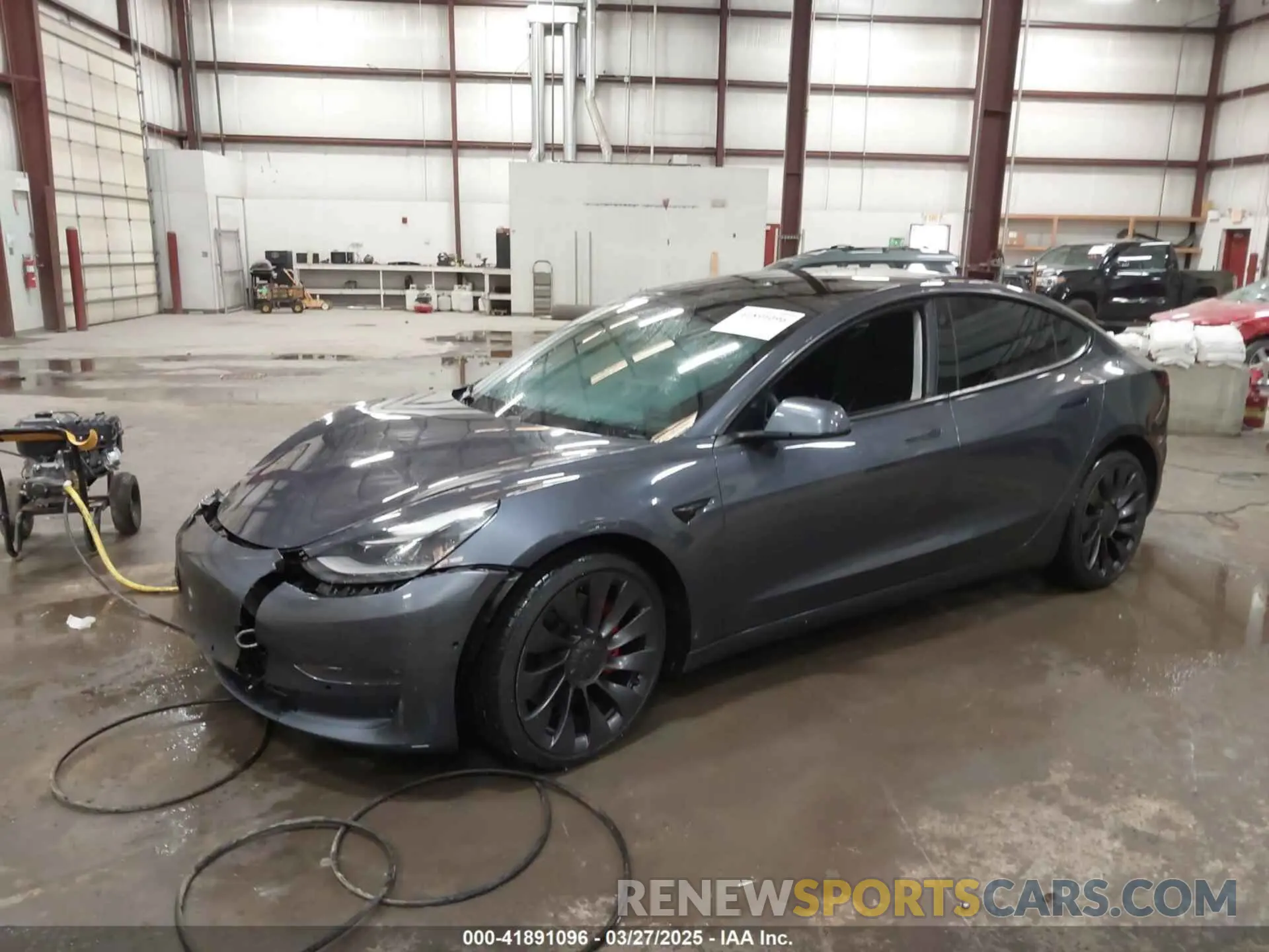 2 fotografías del automóvil dañado 5YJ3E1EC3MF044802 TESLA MODEL 3 2021