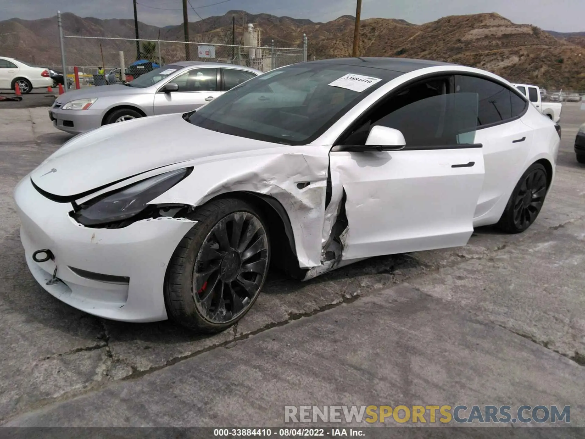 2 fotografías del automóvil dañado 5YJ3E1EC3MF077038 TESLA MODEL 3 2021