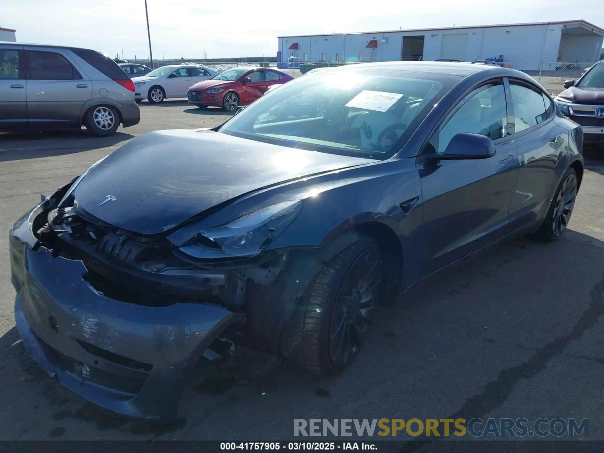 2 fotografías del automóvil dañado 5YJ3E1EC3MF082532 TESLA MODEL 3 2021