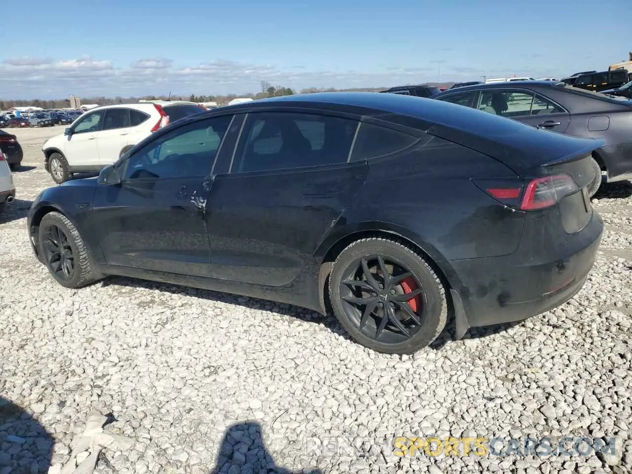 2 fotografías del automóvil dañado 5YJ3E1EC3MF849828 TESLA MODEL 3 2021