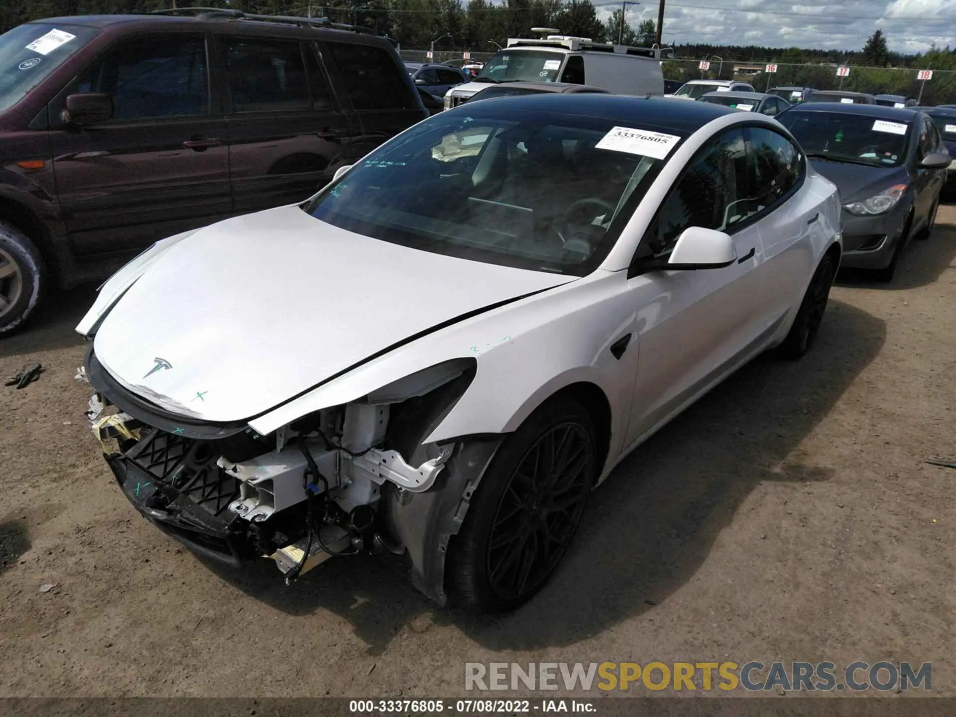 2 fotografías del automóvil dañado 5YJ3E1EC3MF996893 TESLA MODEL 3 2021