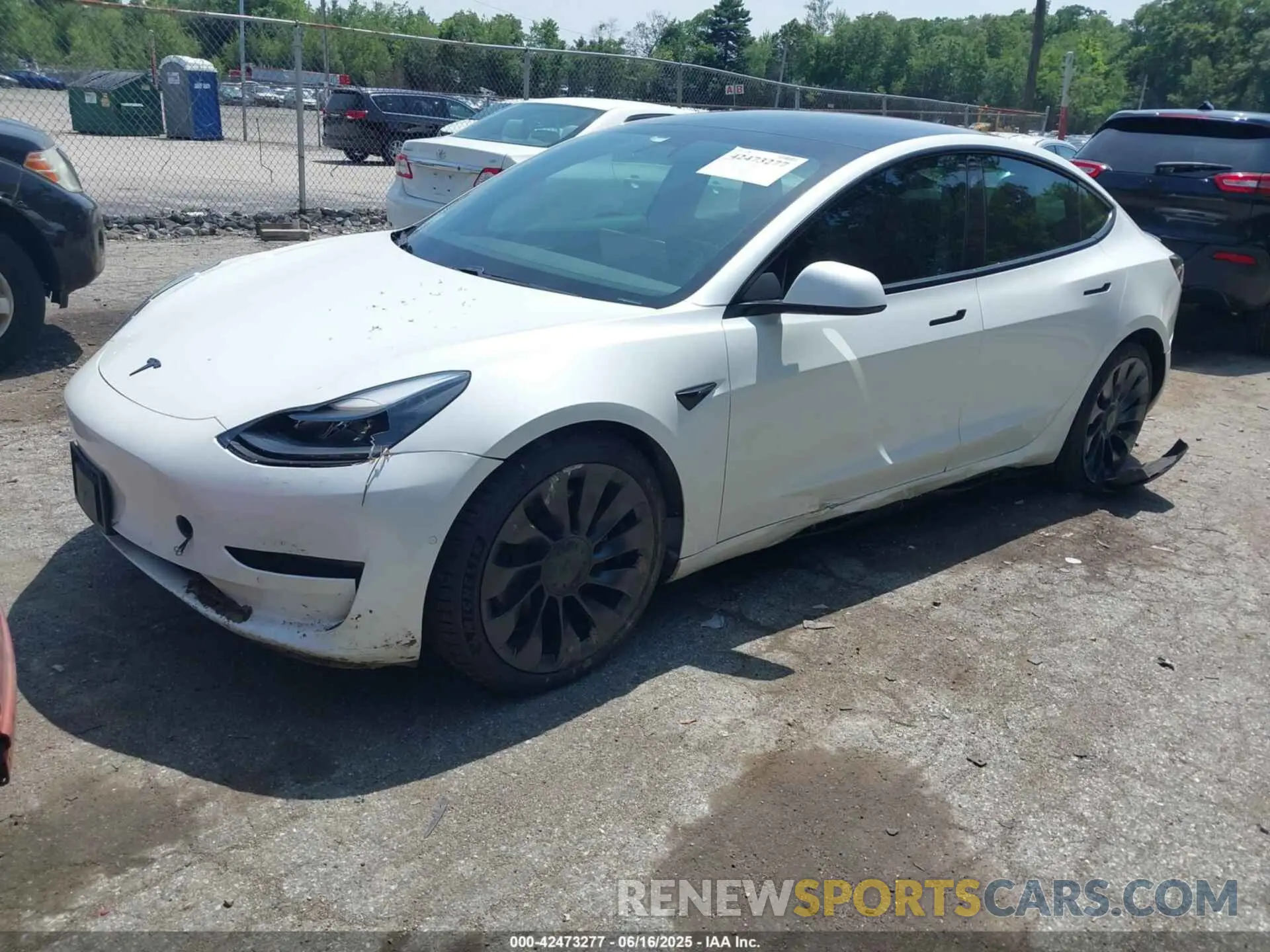 2 fotografías del automóvil dañado 5YJ3E1EC4MF044601 TESLA MODEL 3 2021
