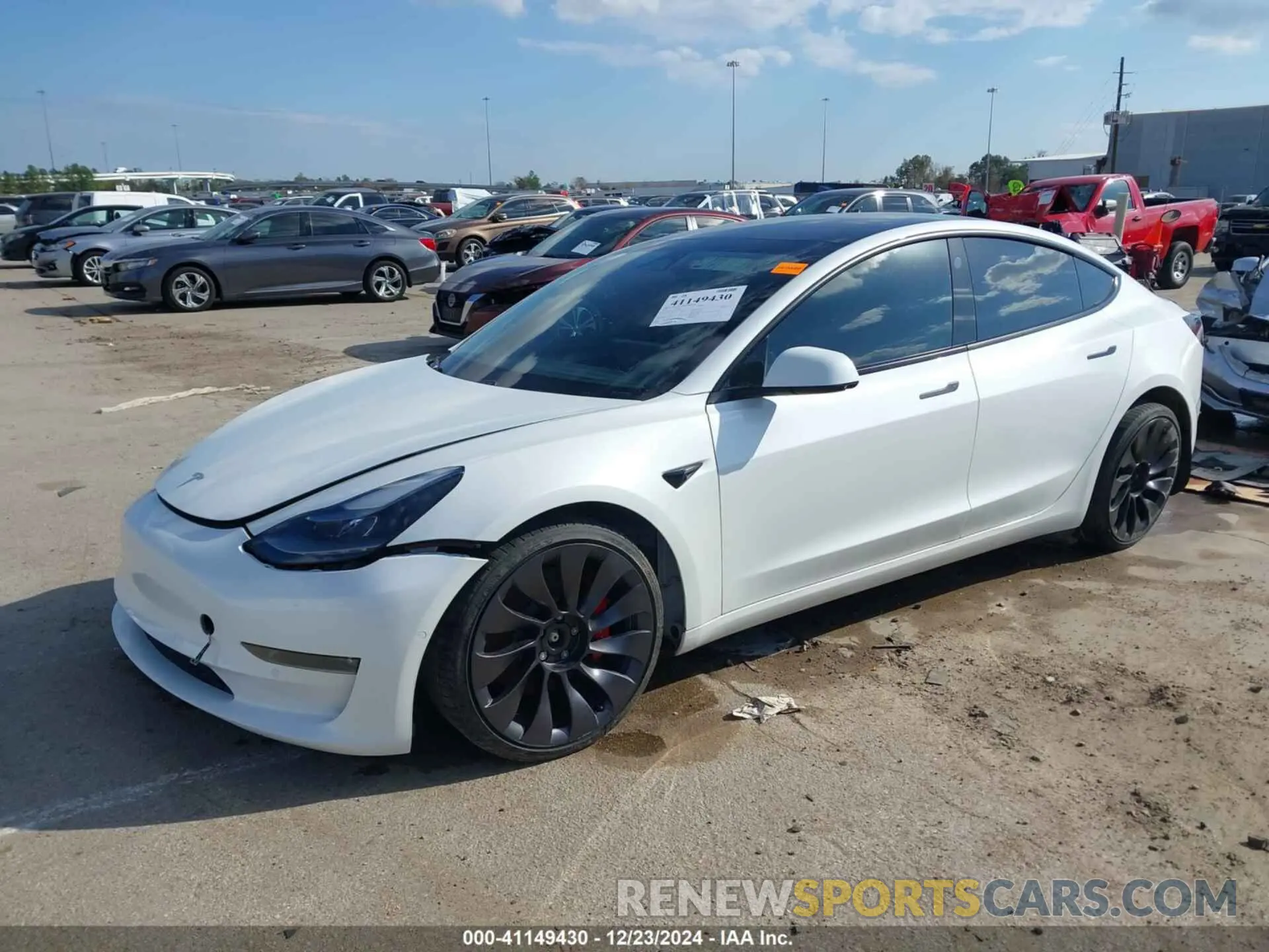 2 fotografías del automóvil dañado 5YJ3E1EC4MF054741 TESLA MODEL 3 2021