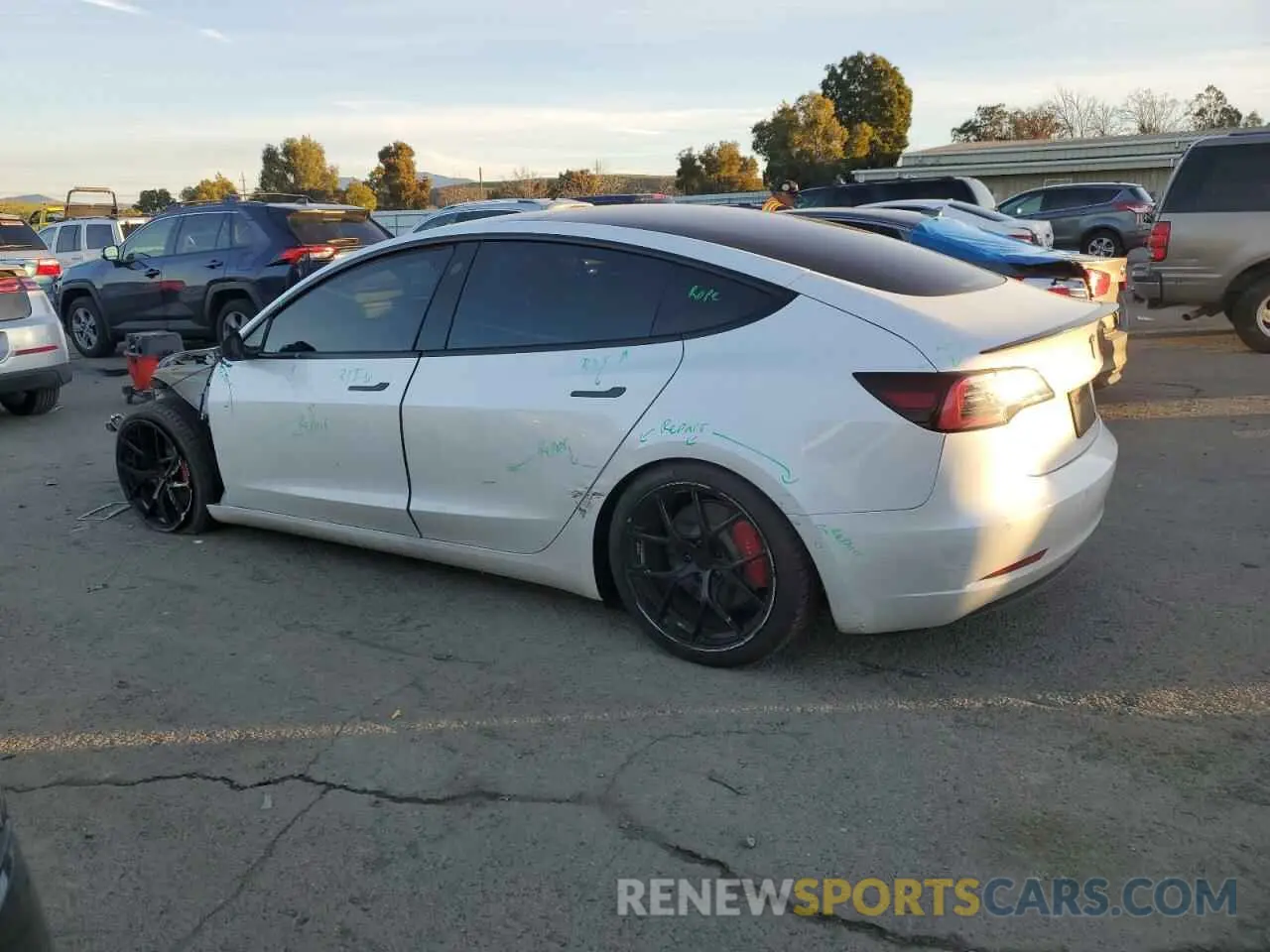 2 fotografías del automóvil dañado 5YJ3E1EC4MF914525 TESLA MODEL 3 2021