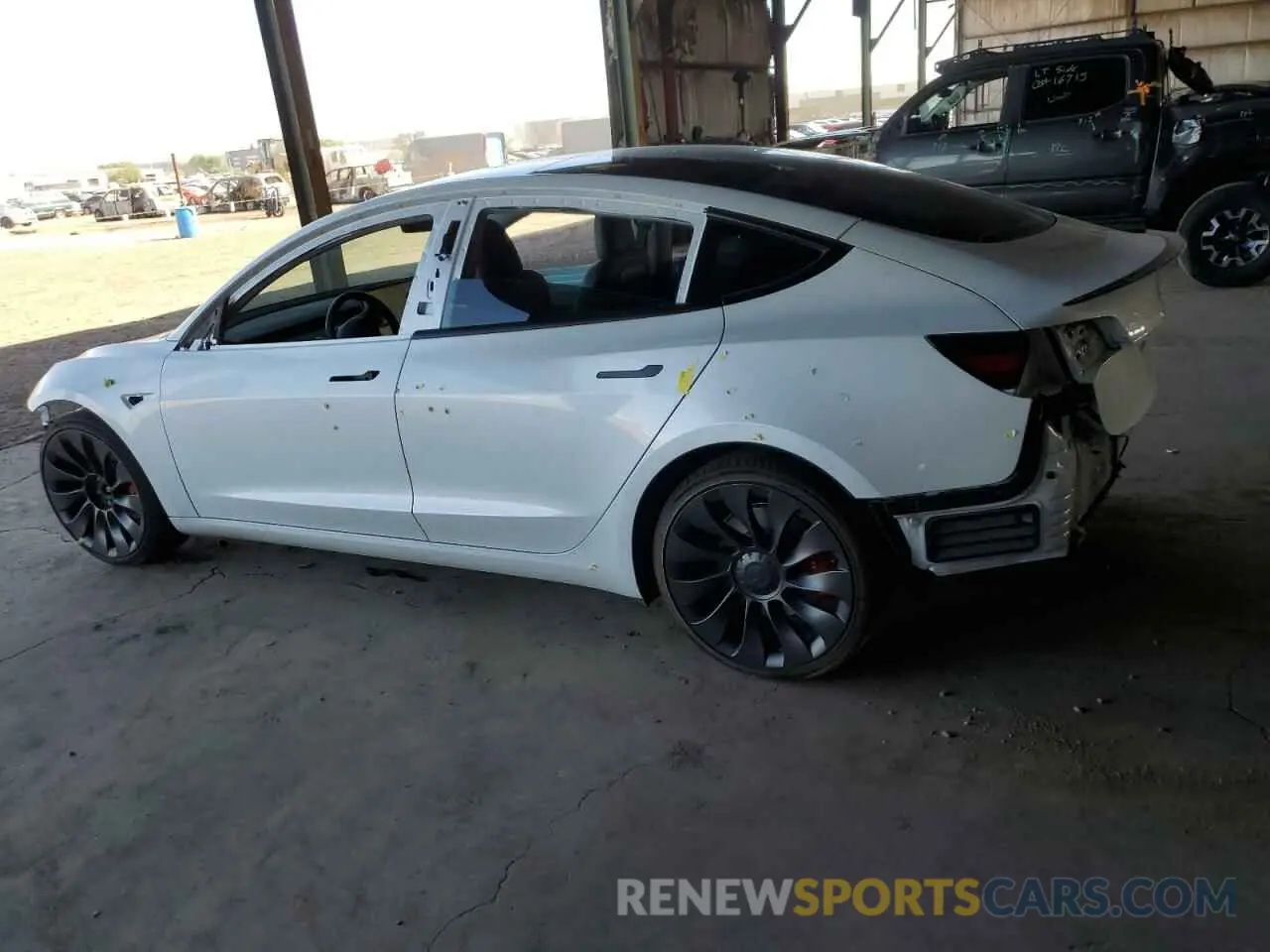 2 fotografías del automóvil dañado 5YJ3E1EC4MF988446 TESLA MODEL 3 2021
