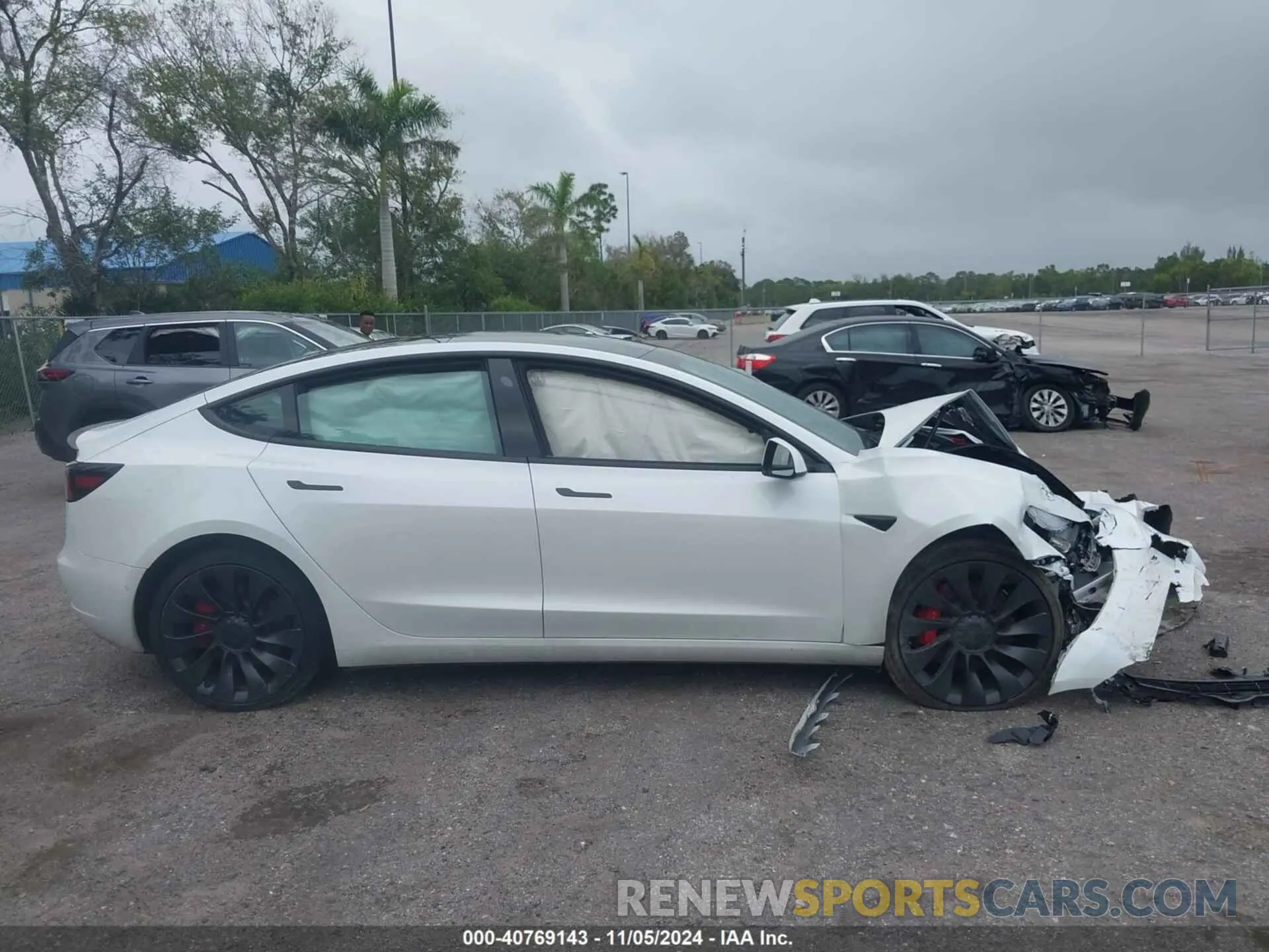 13 fotografías del automóvil dañado 5YJ3E1EC6MF991056 TESLA MODEL 3 2021