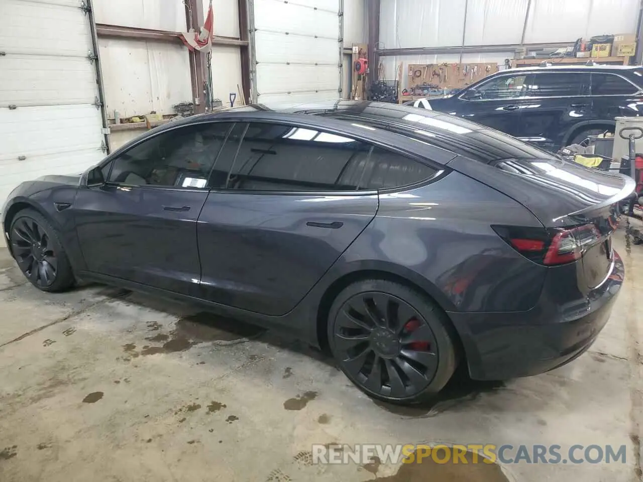 2 fotografías del automóvil dañado 5YJ3E1EC7MF063403 TESLA MODEL 3 2021