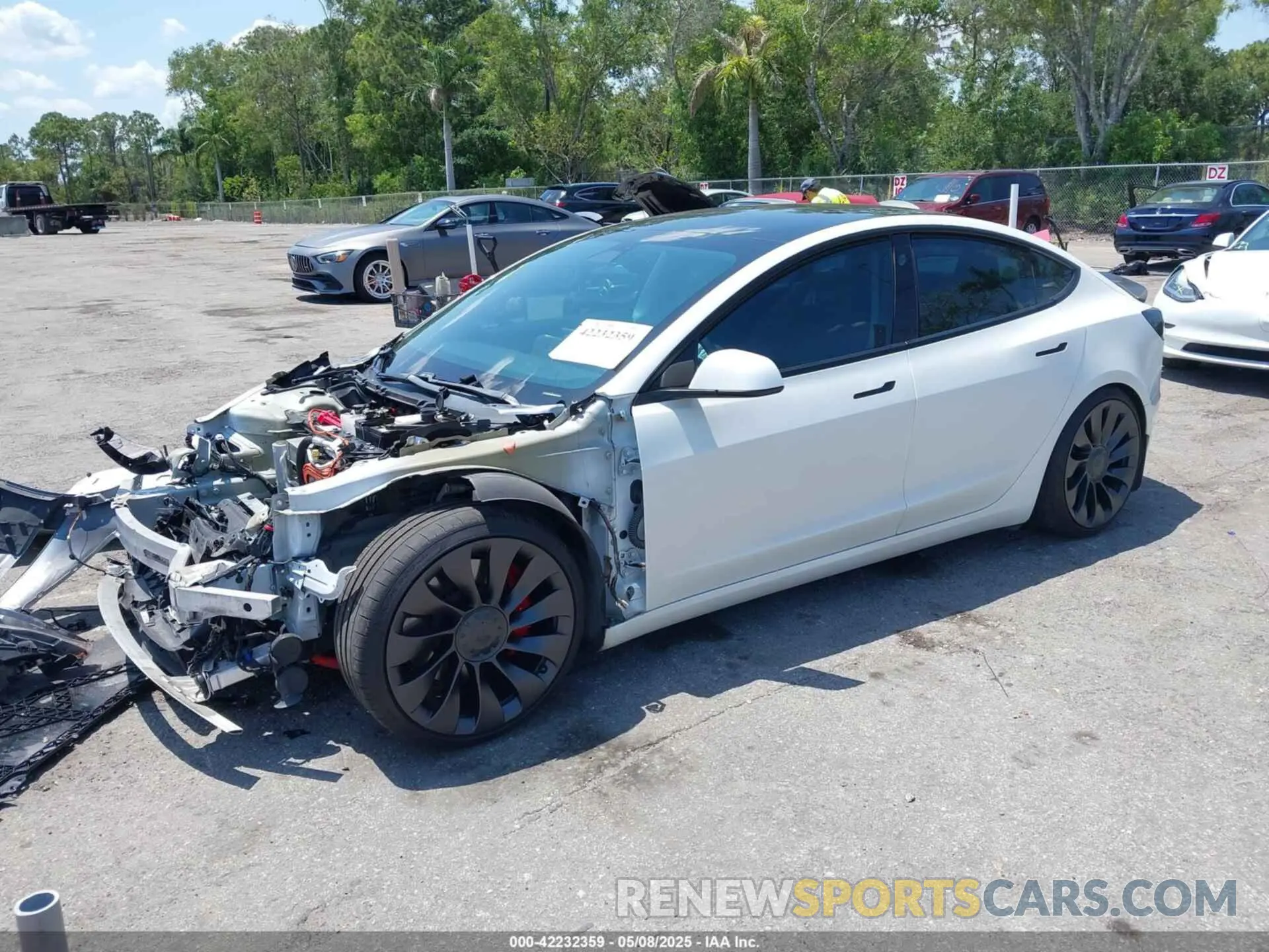 2 fotografías del automóvil dañado 5YJ3E1EC8MF984920 TESLA MODEL 3 2021
