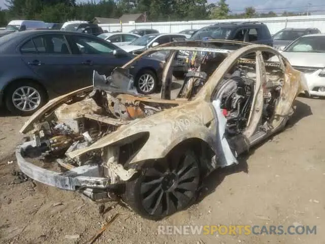 2 fotografías del automóvil dañado 5YJ3E1EC9MF059613 TESLA MODEL 3 2021