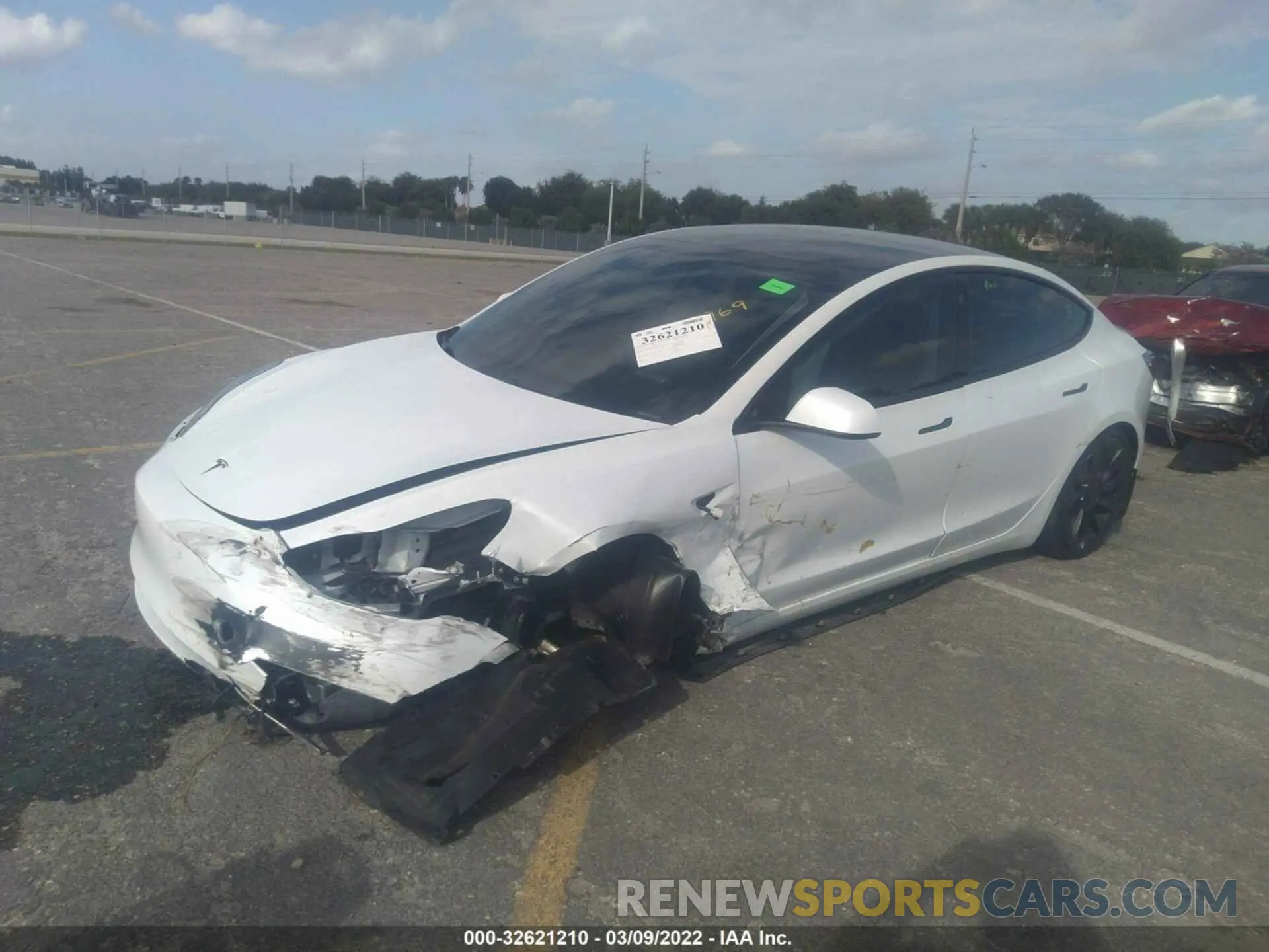 2 fotografías del automóvil dañado 5YJ3E1EC9MF060373 TESLA MODEL 3 2021