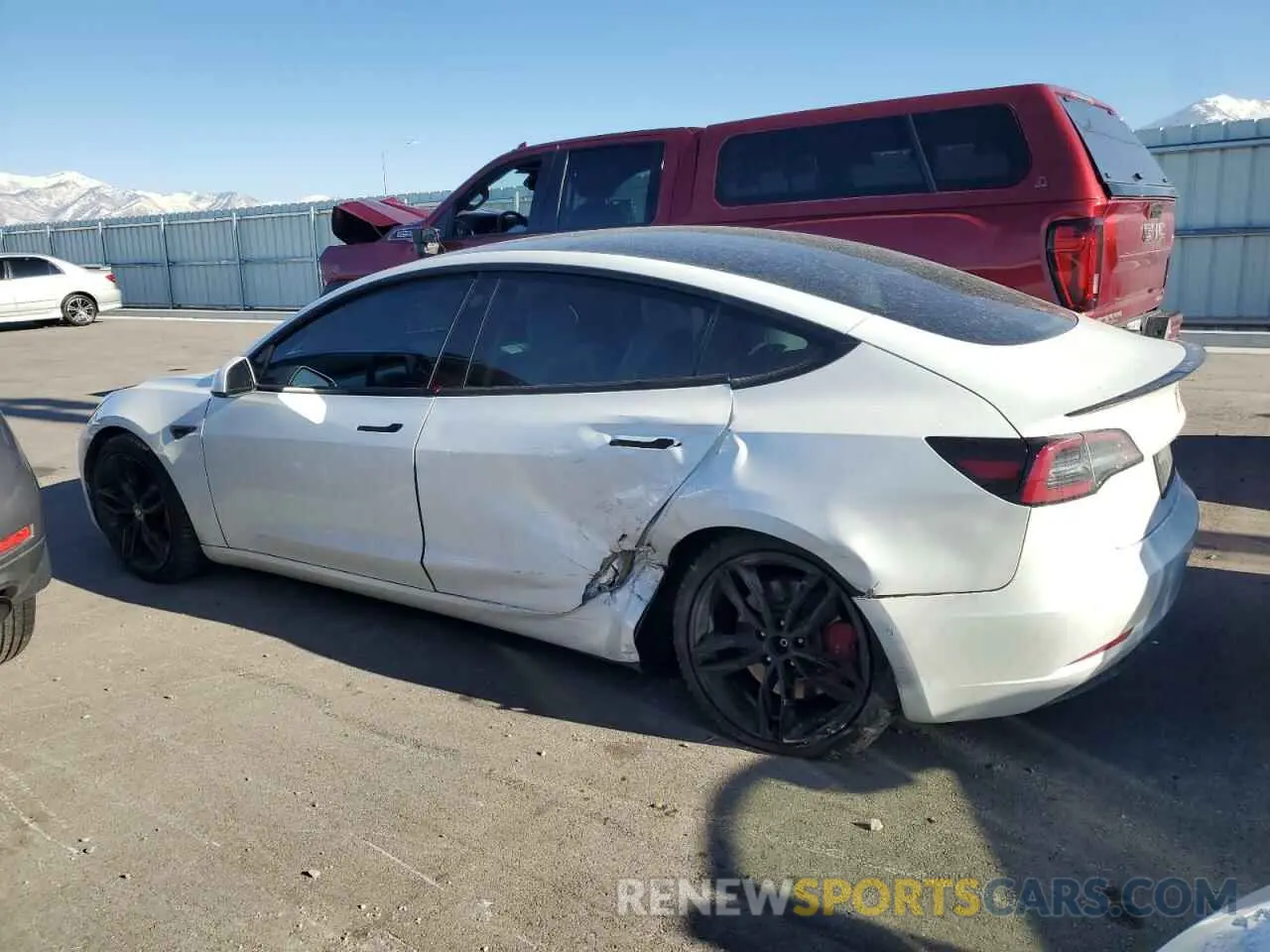 2 fotografías del automóvil dañado 5YJ3E1EC9MF063418 TESLA MODEL 3 2021
