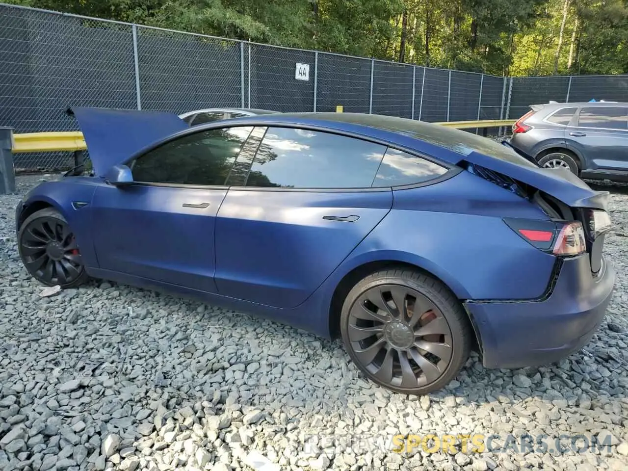 2 fotografías del automóvil dañado 5YJ3E1ECXMF914139 TESLA MODEL 3 2021