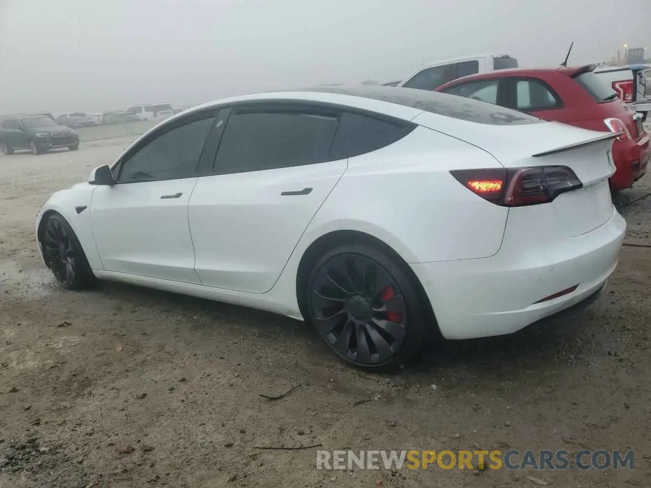 2 fotografías del automóvil dañado 5YJ3E1ECXMF984417 TESLA MODEL 3 2021