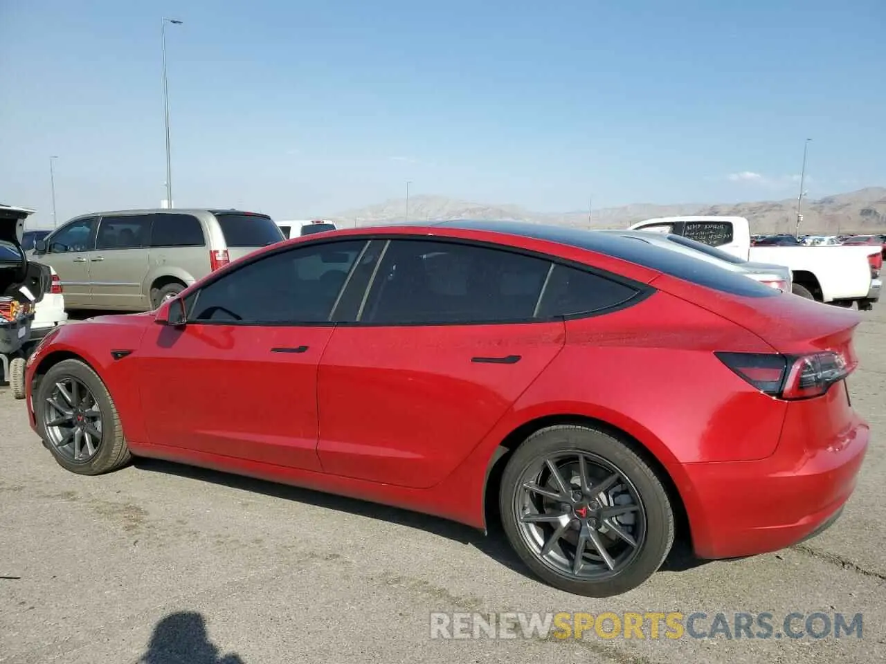 2 fotografías del automóvil dañado 5YJ3E1EA0NF115227 TESLA MODEL 3 2022