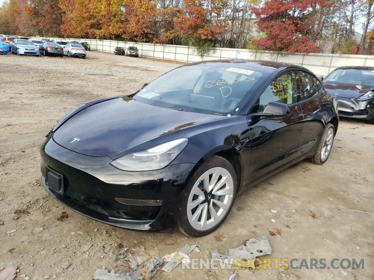 2 fotografías del automóvil dañado 5YJ3E1EA0NF187237 TESLA MODEL 3 2022