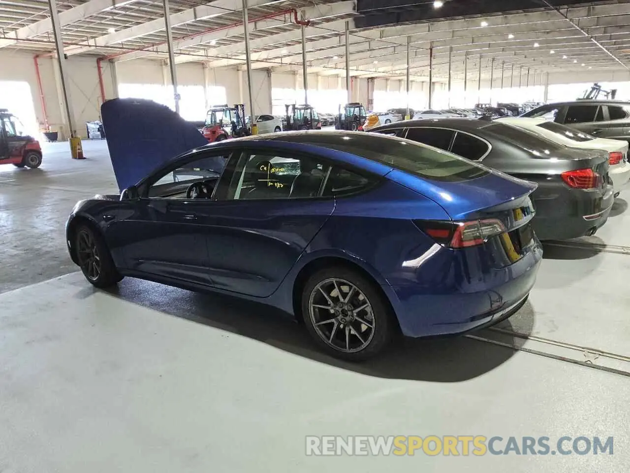 2 fotografías del automóvil dañado 5YJ3E1EA0NF290058 TESLA MODEL 3 2022