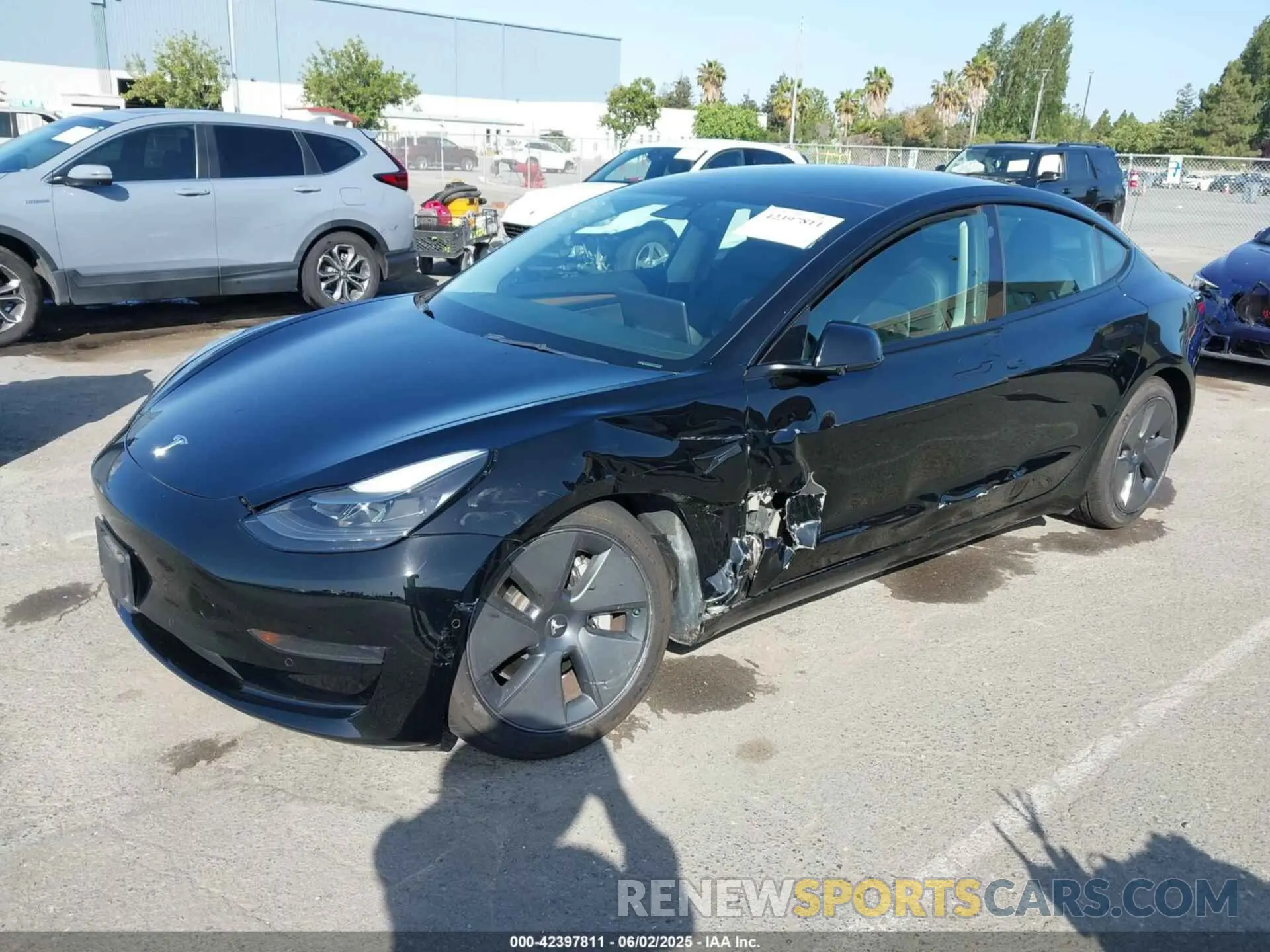 2 fotografías del automóvil dañado 5YJ3E1EA1NF103460 TESLA MODEL 3 2022