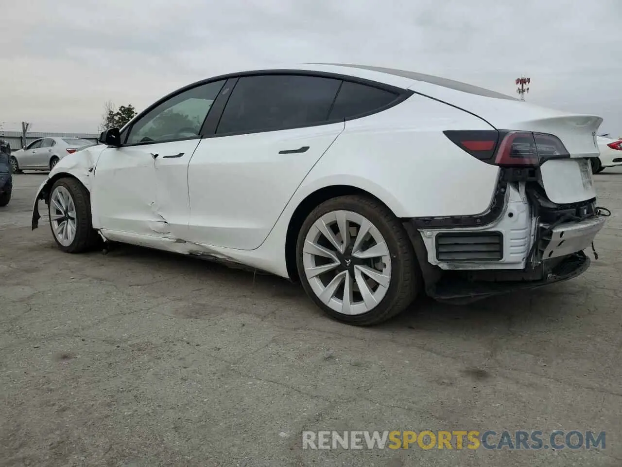 2 fotografías del automóvil dañado 5YJ3E1EA1NF143263 TESLA MODEL 3 2022