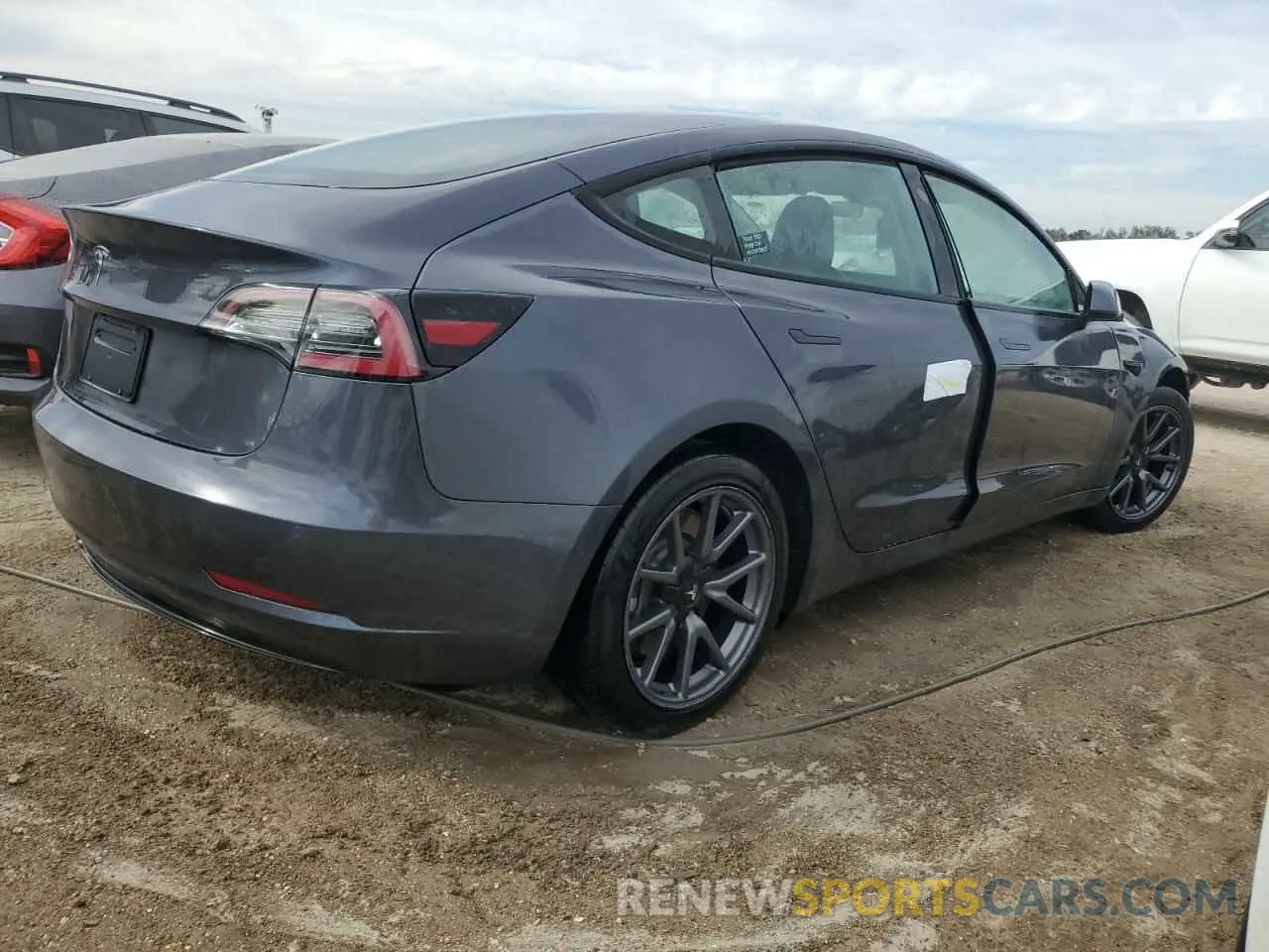 3 fotografías del automóvil dañado 5YJ3E1EA1NF187621 TESLA MODEL 3 2022