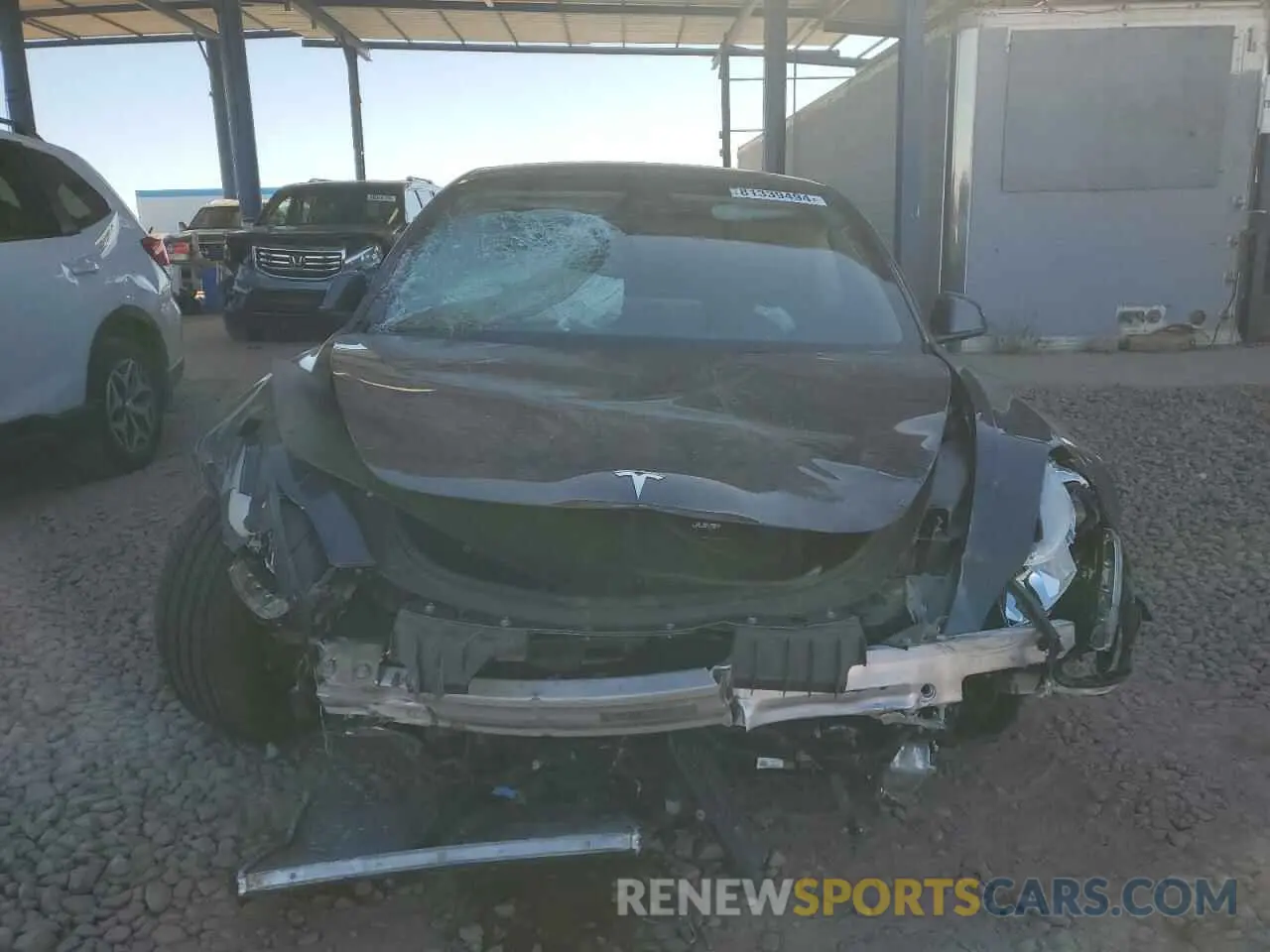 5 fotografías del automóvil dañado 5YJ3E1EA1NF328249 TESLA MODEL 3 2022