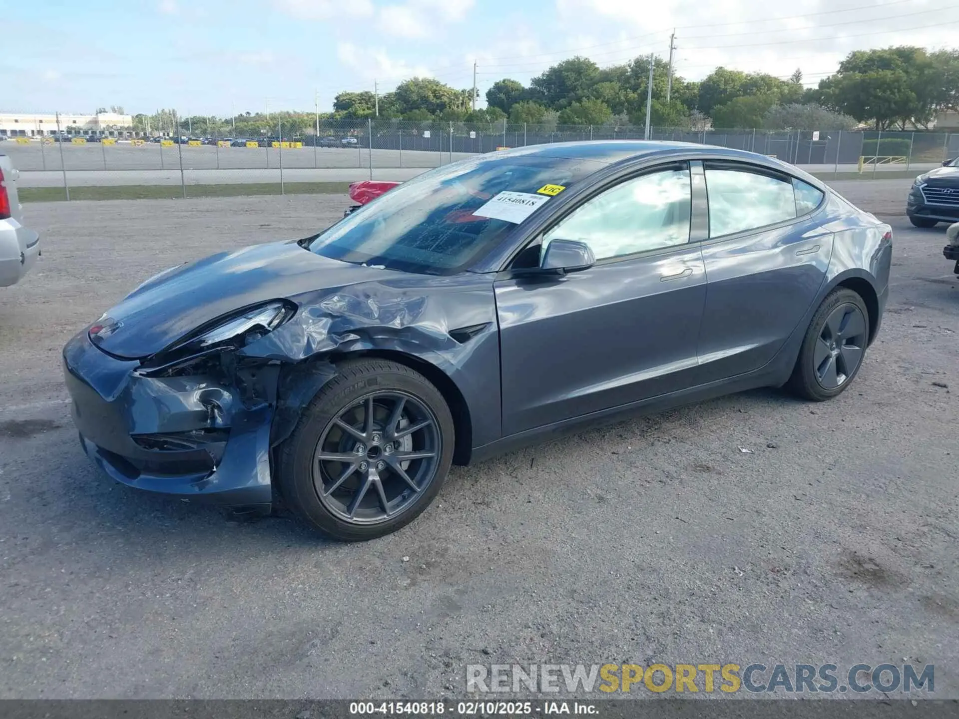 2 fotografías del automóvil dañado 5YJ3E1EA1NF338196 TESLA MODEL 3 2022