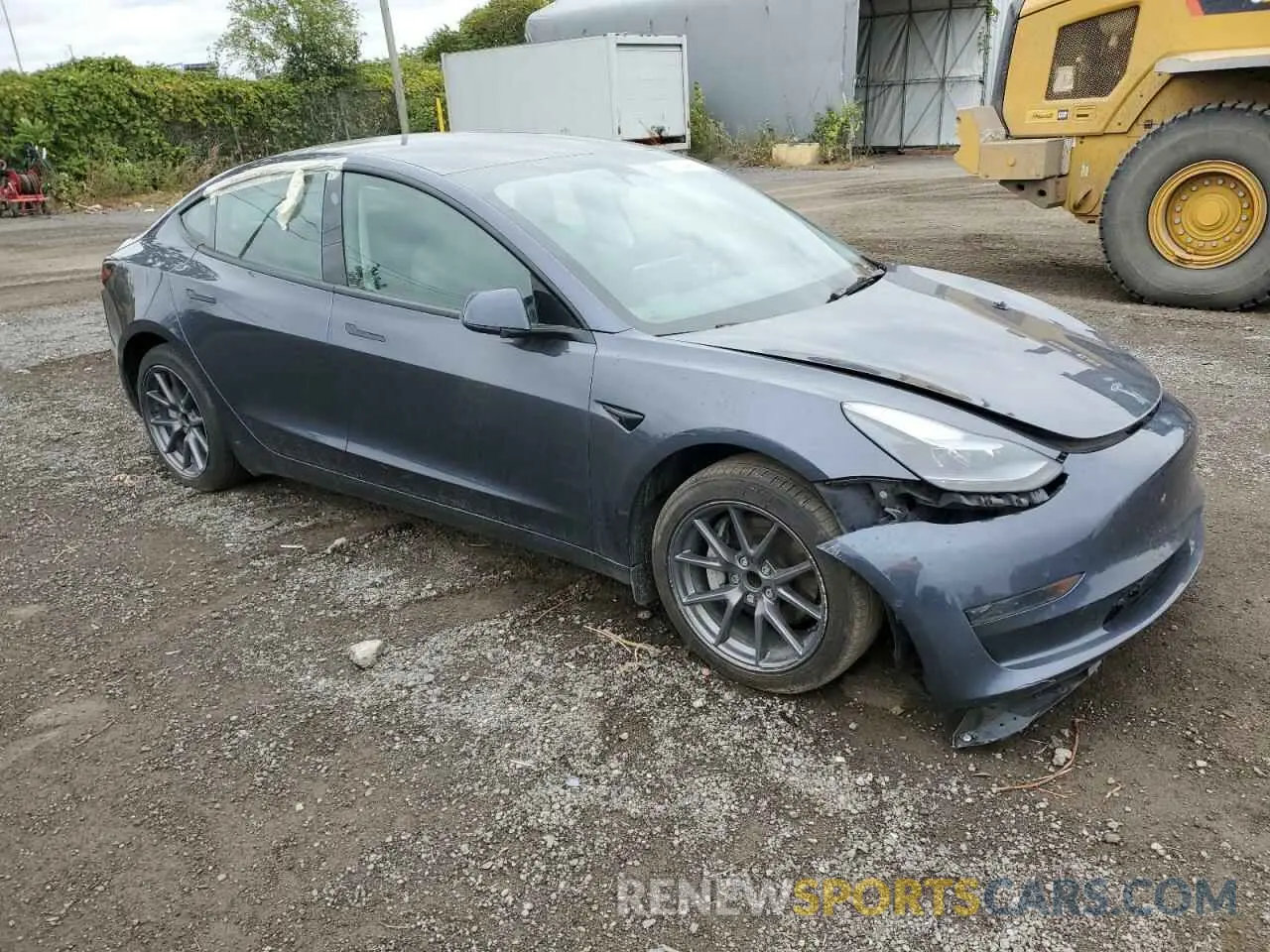 4 fotografías del automóvil dañado 5YJ3E1EA1NF348727 TESLA MODEL 3 2022