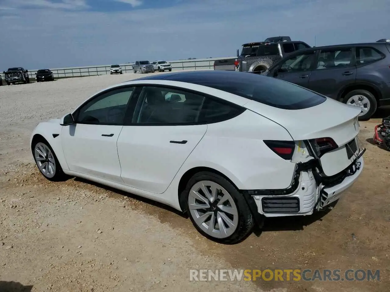 2 fotografías del automóvil dañado 5YJ3E1EA2NF285959 TESLA MODEL 3 2022