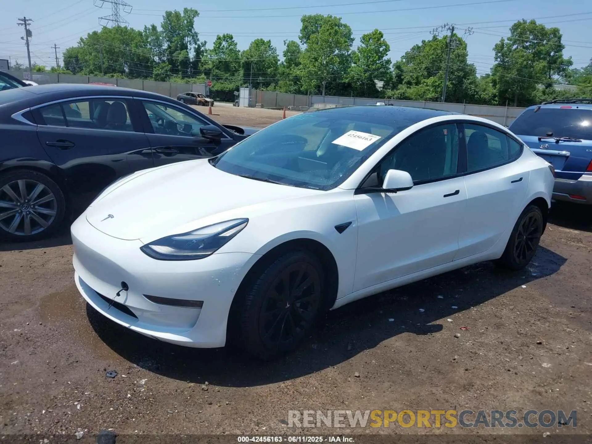 2 fotografías del automóvil dañado 5YJ3E1EA2NF285962 TESLA MODEL 3 2022