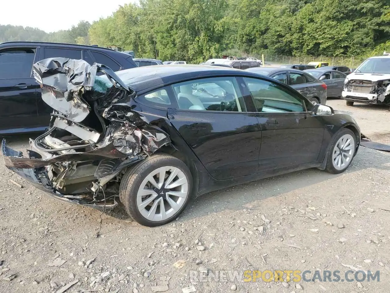 3 fotografías del automóvil dañado 5YJ3E1EA2NF302629 TESLA MODEL 3 2022