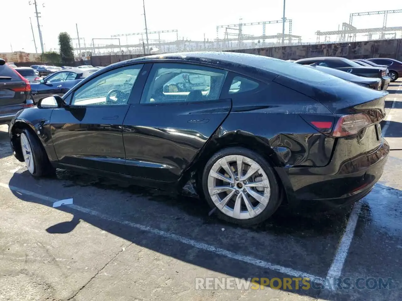 2 fotografías del automóvil dañado 5YJ3E1EA2NF304624 TESLA MODEL 3 2022