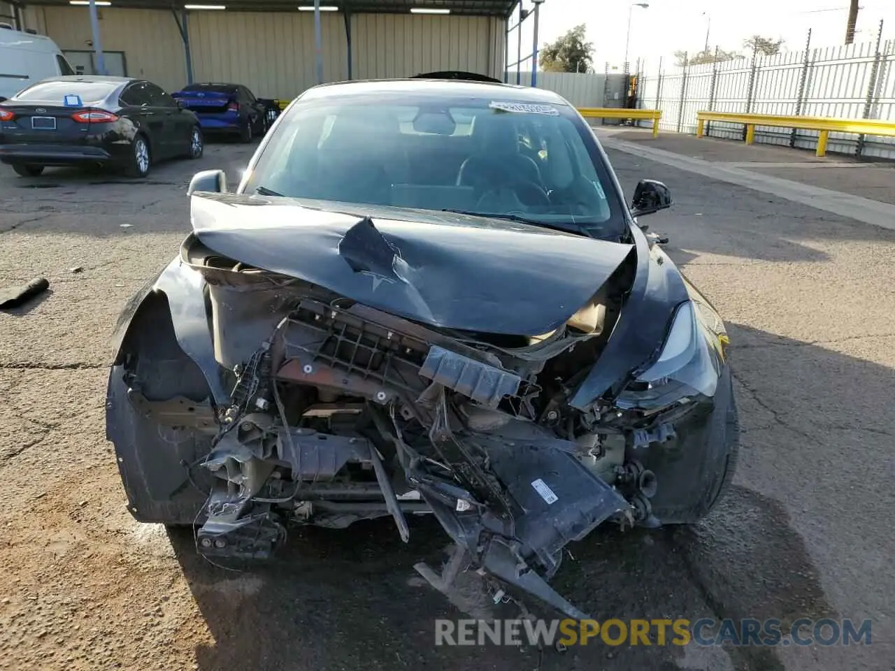5 fotografías del automóvil dañado 5YJ3E1EA2NF304638 TESLA MODEL 3 2022
