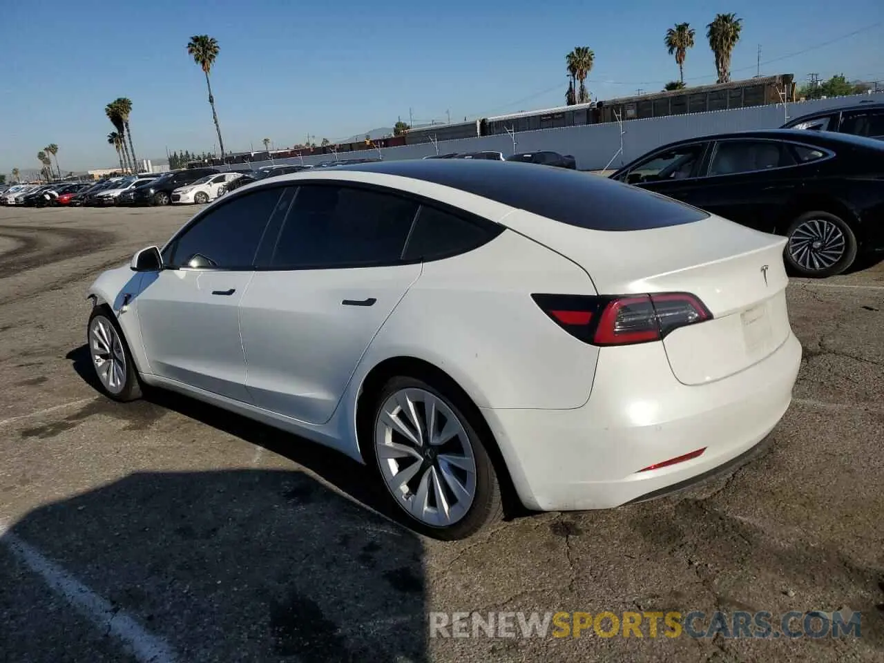 2 fotografías del automóvil dañado 5YJ3E1EA3NF145161 TESLA MODEL 3 2022