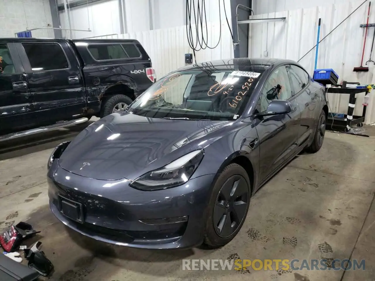 2 fotografías del automóvil dañado 5YJ3E1EA3NF191248 TESLA MODEL 3 2022