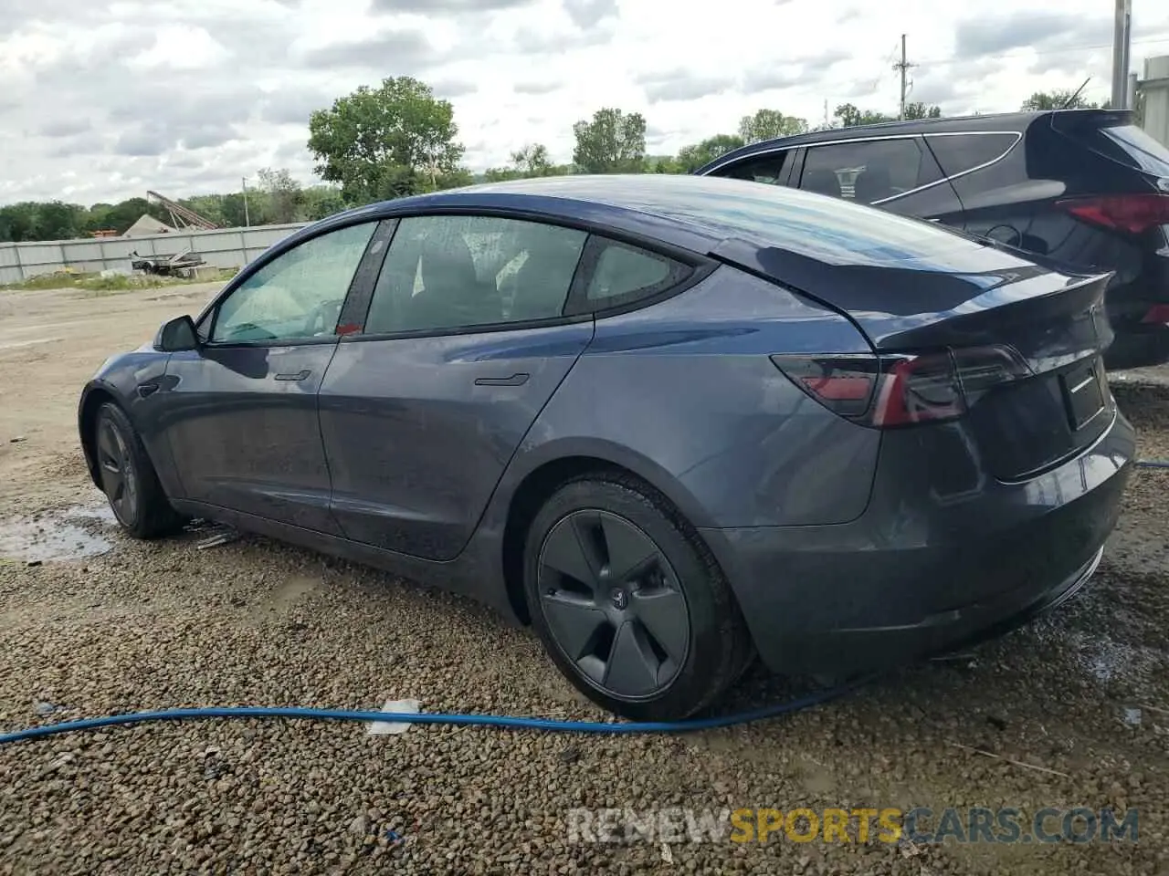 2 fotografías del automóvil dañado 5YJ3E1EA3NF287056 TESLA MODEL 3 2022