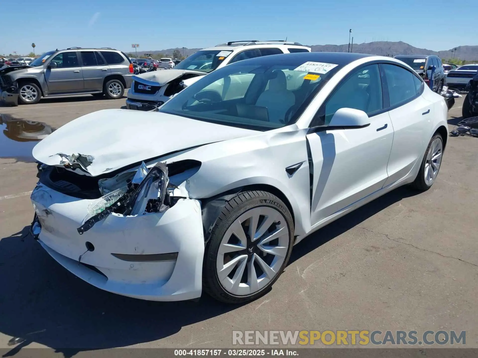 2 fotografías del automóvil dañado 5YJ3E1EA3NF357638 TESLA MODEL 3 2022