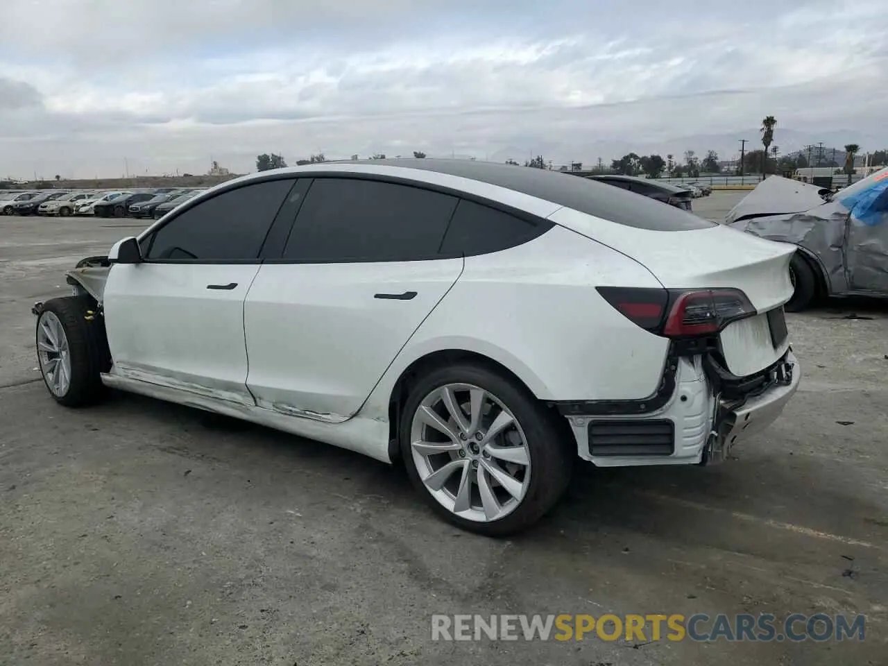 2 fotografías del automóvil dañado 5YJ3E1EA3NF358661 TESLA MODEL 3 2022
