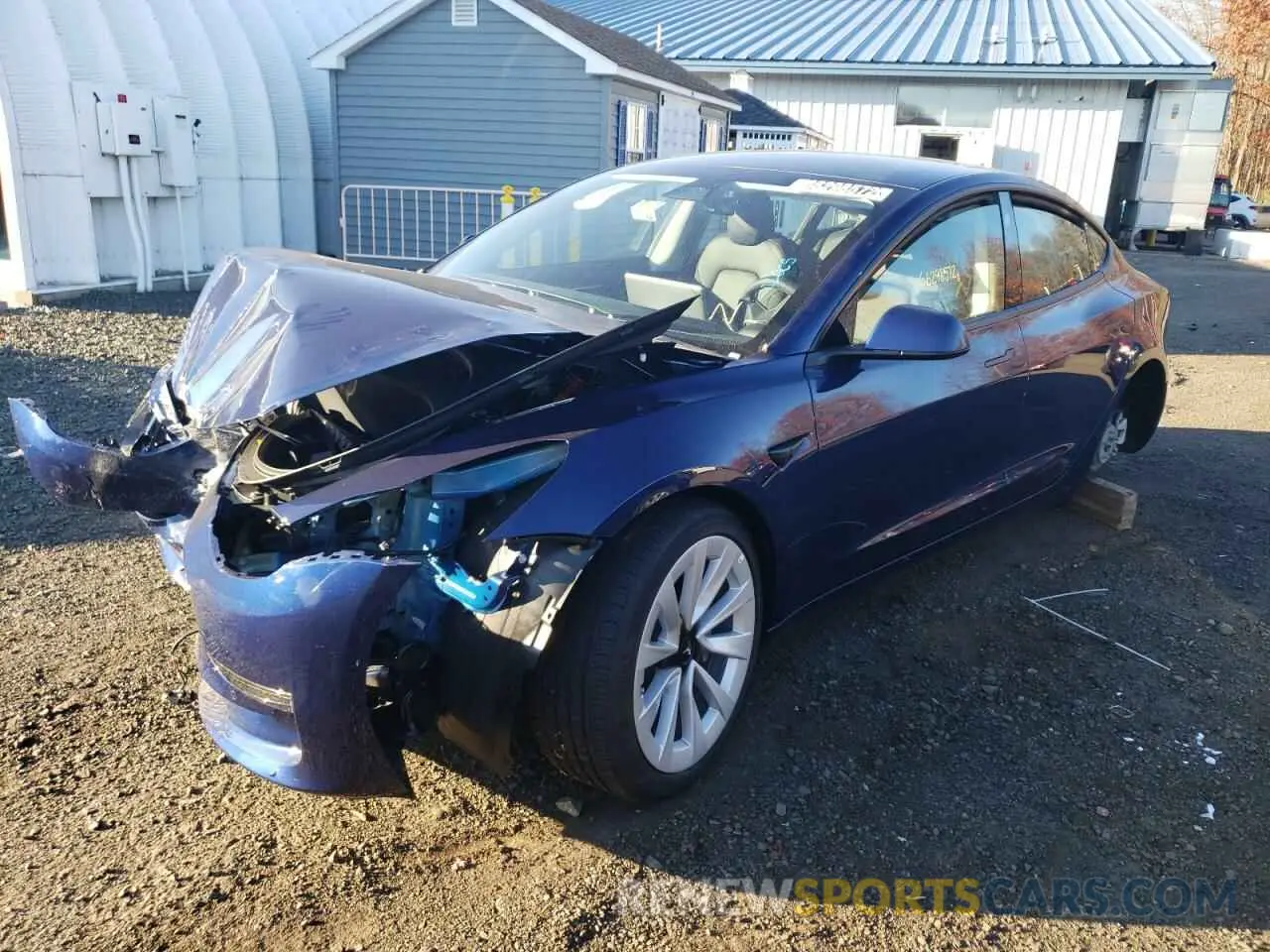 2 fotografías del automóvil dañado 5YJ3E1EA3NF371930 TESLA MODEL 3 2022