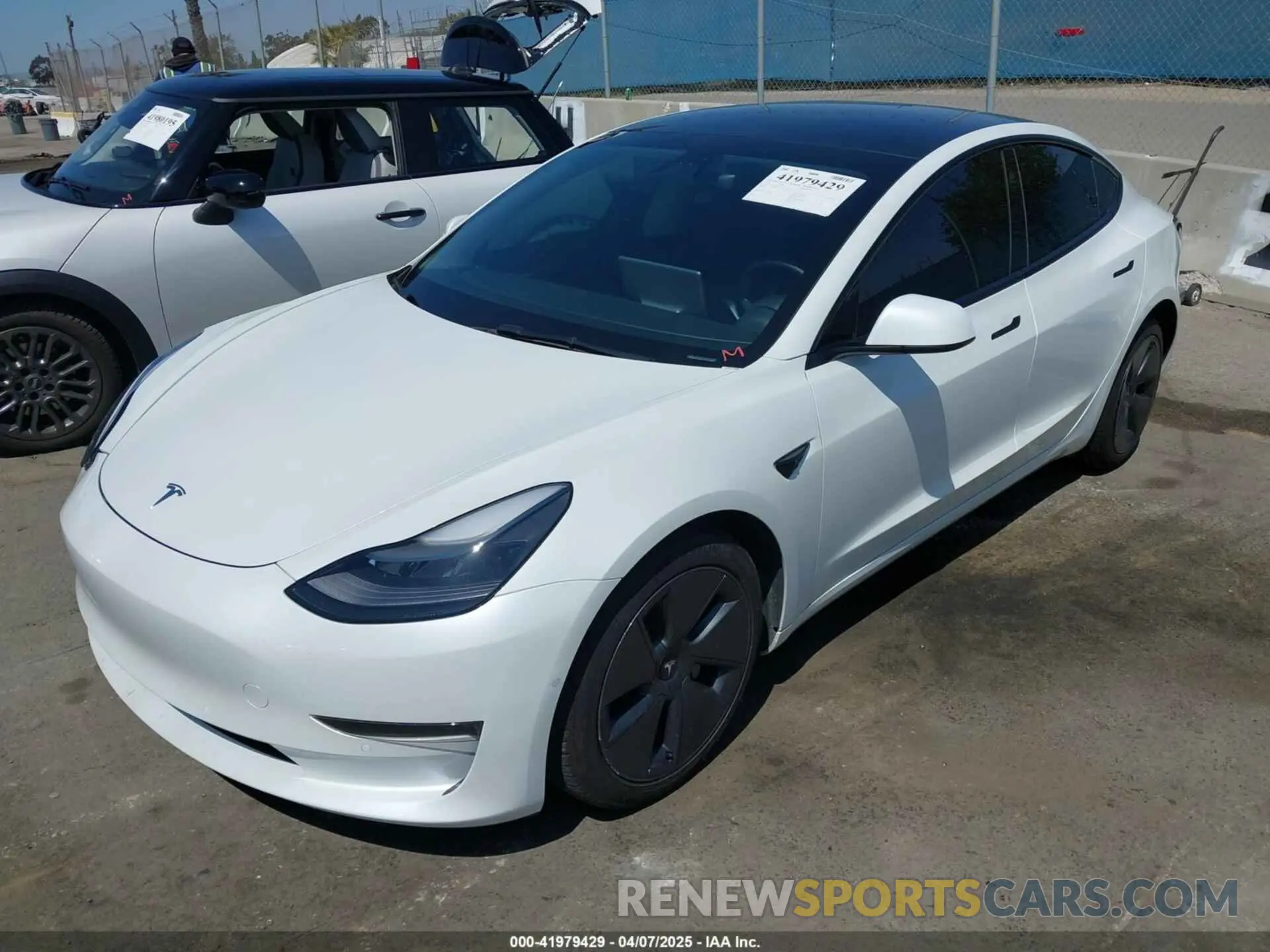 2 fotografías del automóvil dañado 5YJ3E1EA4NF114033 TESLA MODEL 3 2022