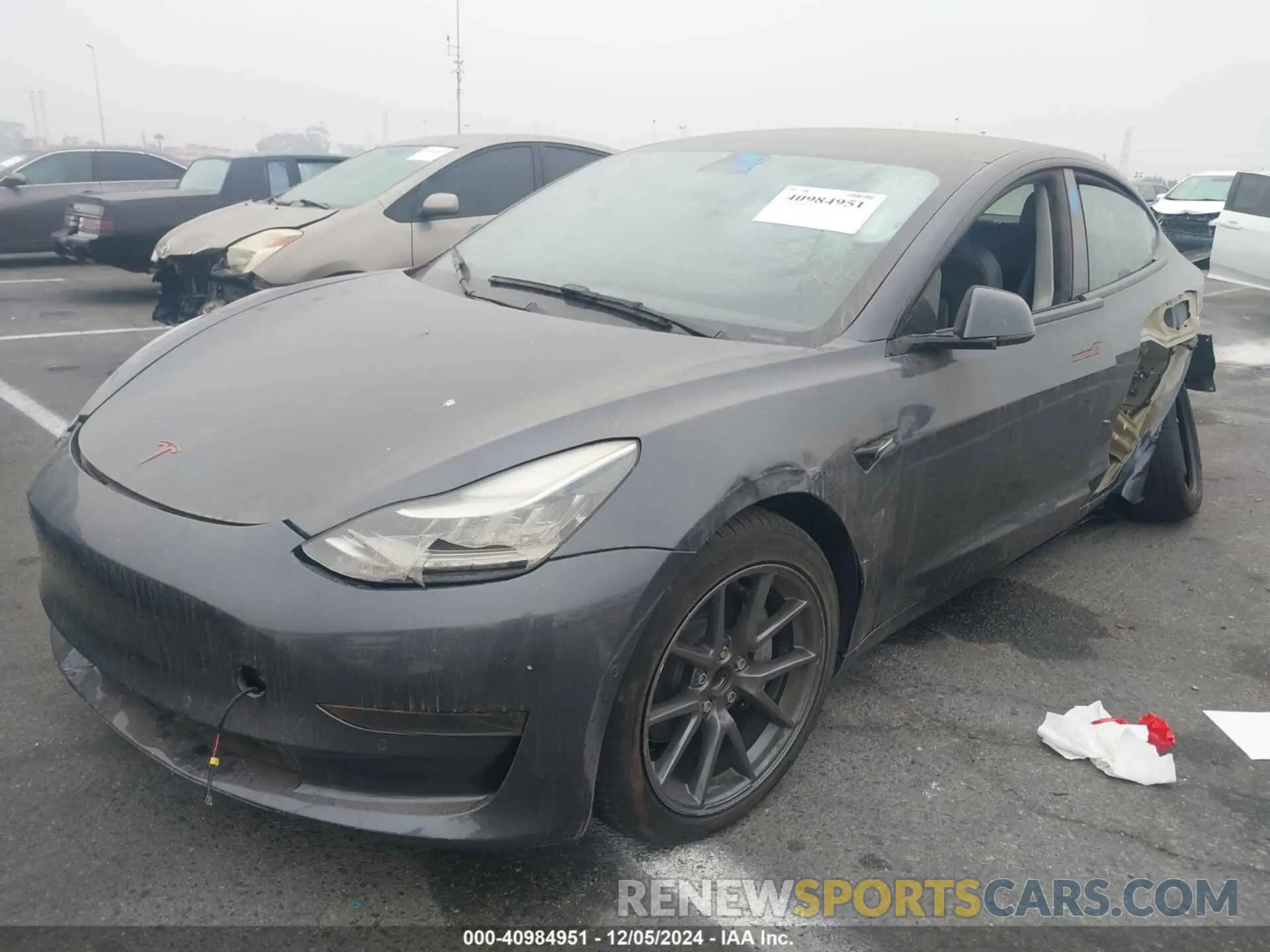 2 fotografías del automóvil dañado 5YJ3E1EA4NF210499 TESLA MODEL 3 2022