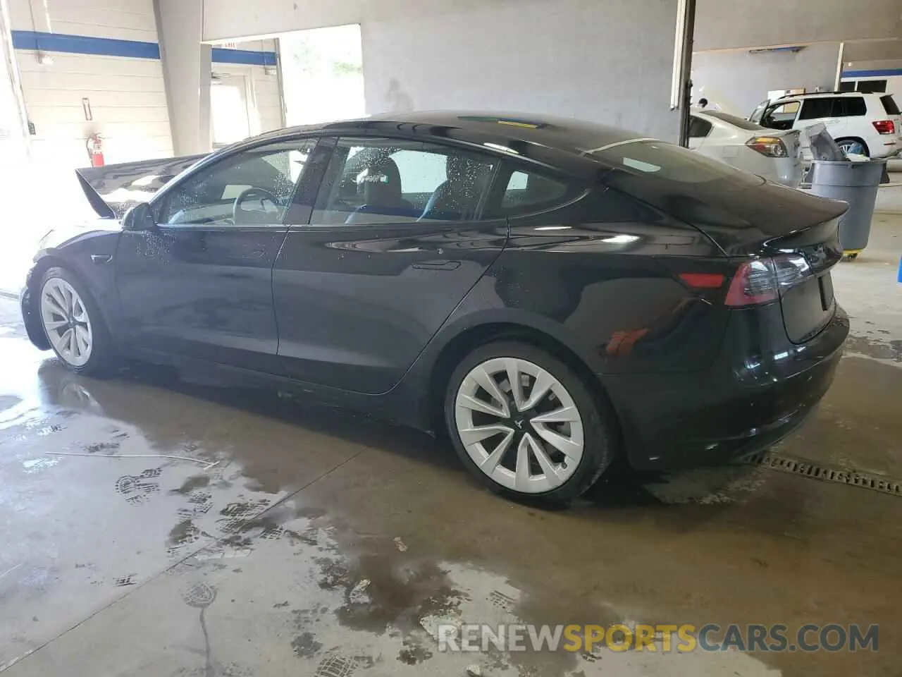 2 fotografías del automóvil dañado 5YJ3E1EA4NF304611 TESLA MODEL 3 2022