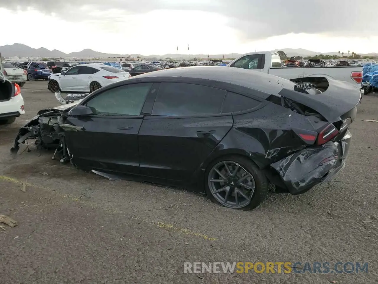 2 fotografías del automóvil dañado 5YJ3E1EA4NF347815 TESLA MODEL 3 2022